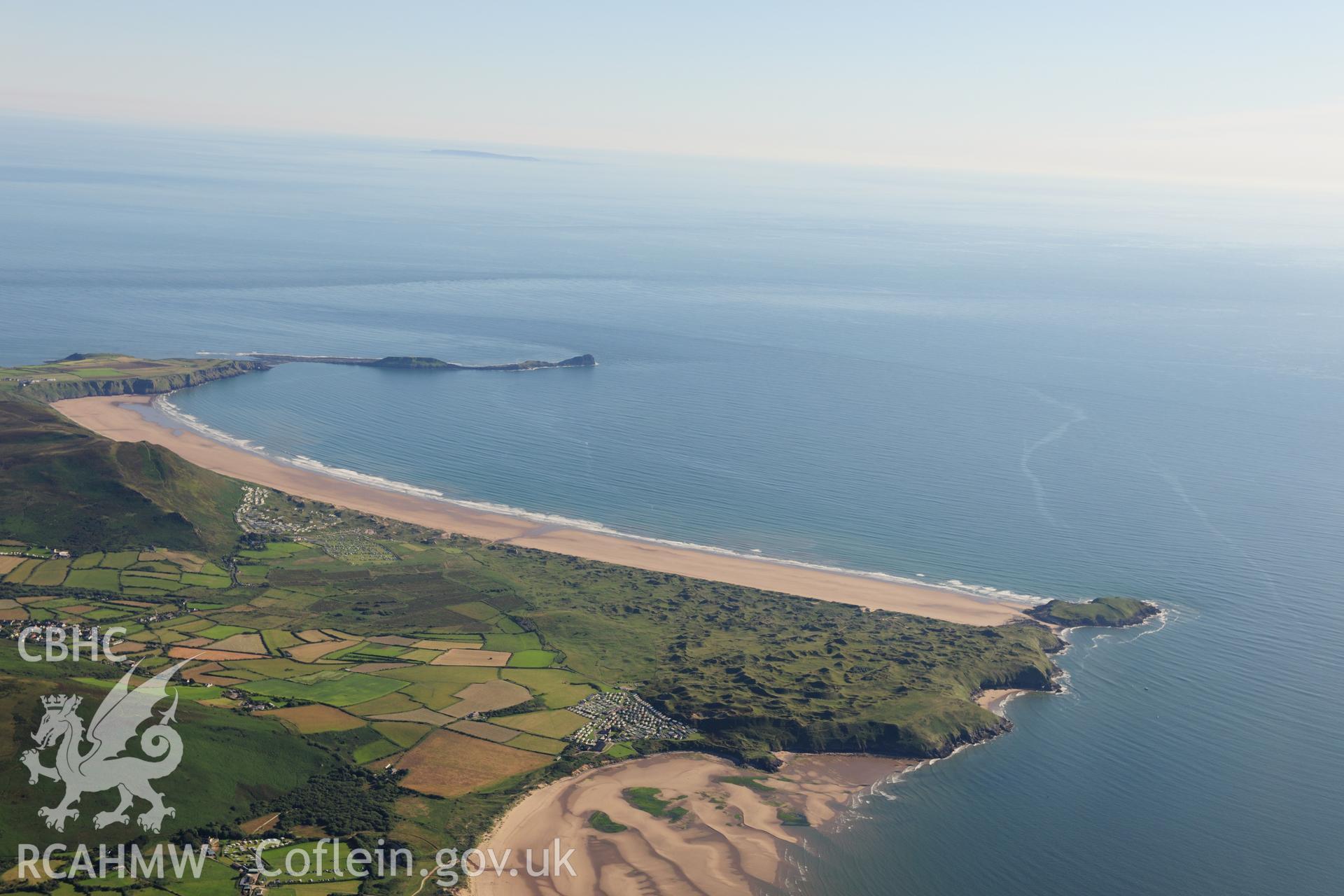 RCAHMW colour oblique photograph of West Gower, high landscape view over Llangennith Burrows. Taken by Toby Driver on 24/07/2012.