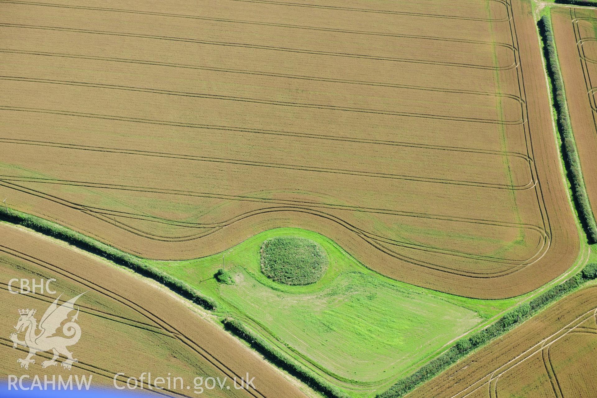 RCAHMW colour oblique photograph of Mynydd Herbert round barrow. Taken by Toby Driver on 24/07/2012.