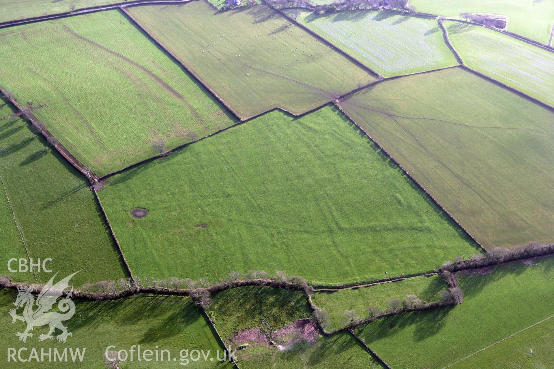 RCAHMW colour oblique photograph of Tai Cochion field system and settlement earthworks. Taken by Toby Driver on 13/01/2012.