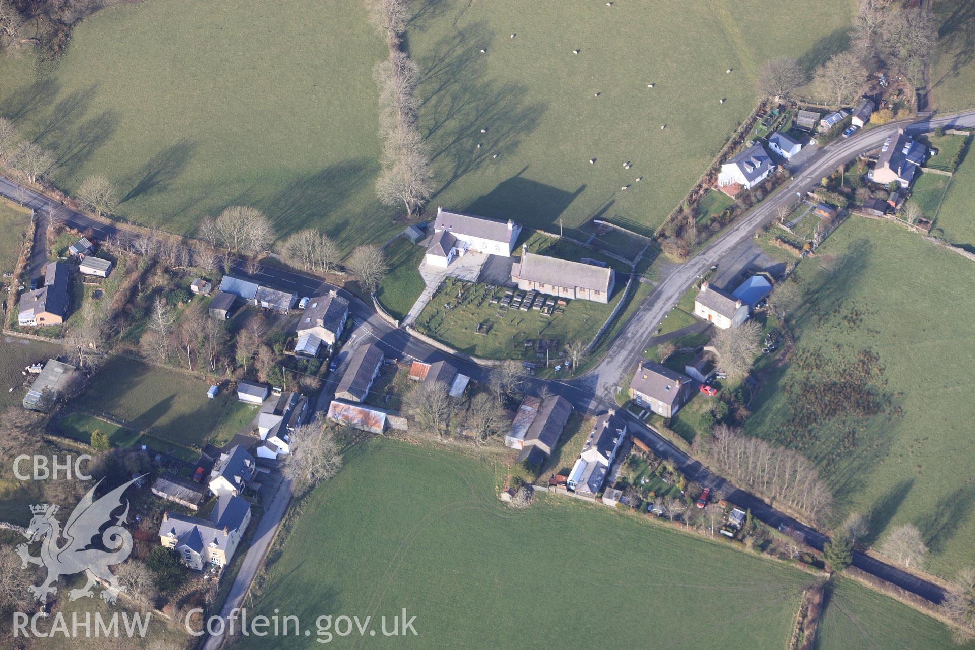 RCAHMW colour oblique photograph of St John the Baptist Church, Ystrad Meurig. Taken by Toby Driver on 07/02/2012.