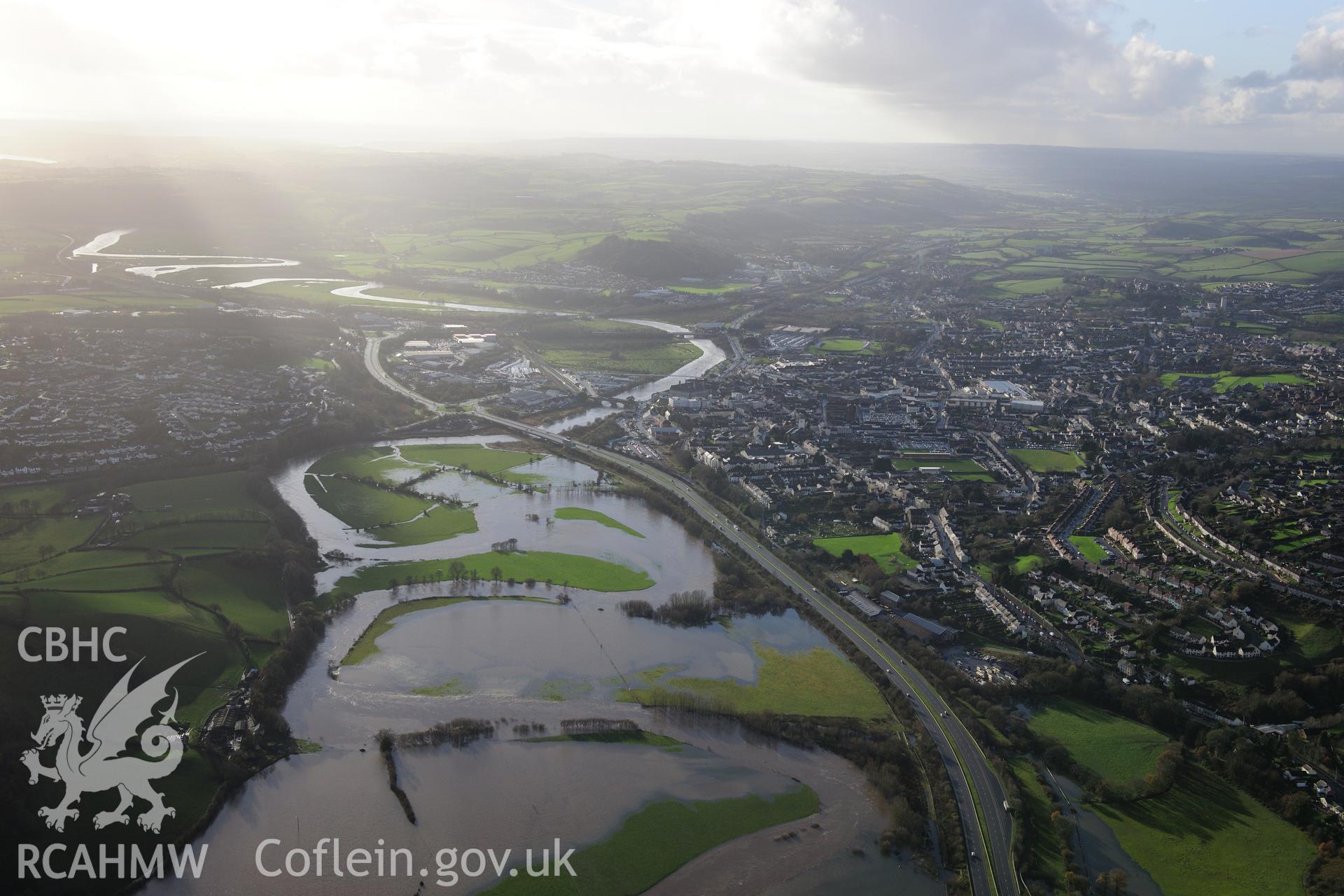 RCAHMW colour oblique photograph of Carmarthen townscape, with floods, view from north-east. Taken by Toby Driver on 23/11/2012.