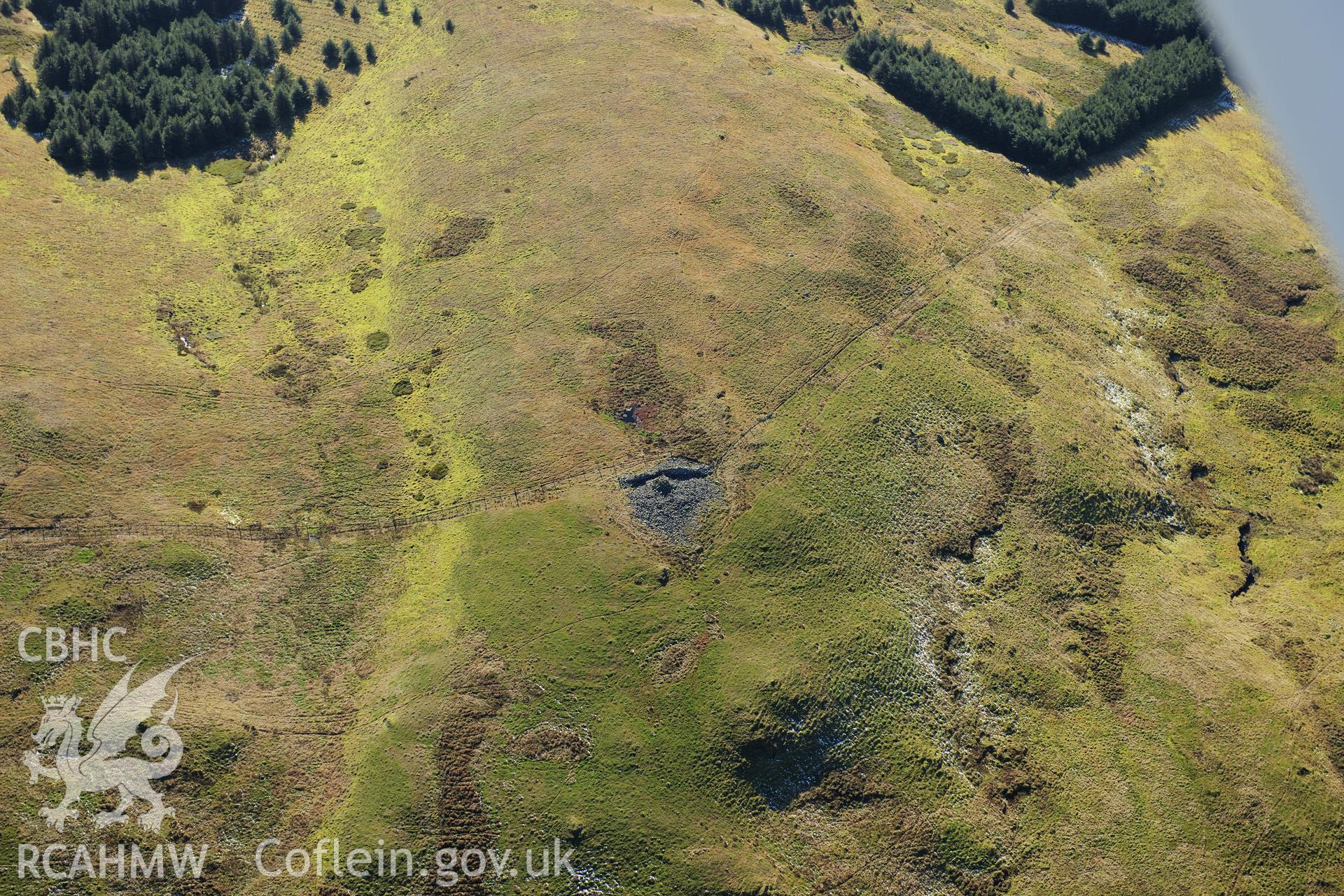 RCAHMW colour oblique photograph of Y Garn cairn. Taken by Toby Driver on 05/11/2012.