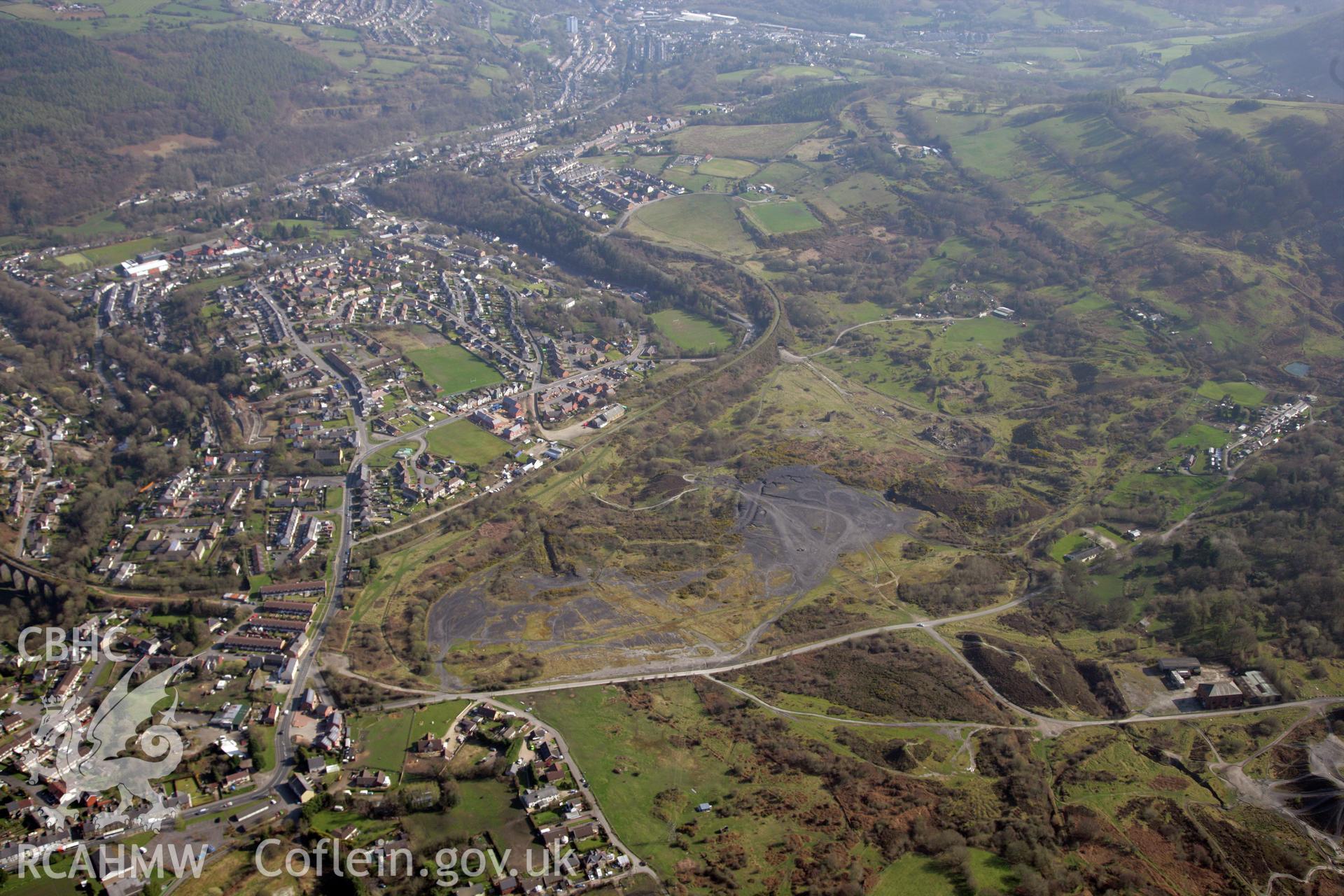 RCAHMW colour oblique photograph of British Ironworks, distant view from the north. Taken by Toby Driver and Oliver Davies on 28/03/2012.