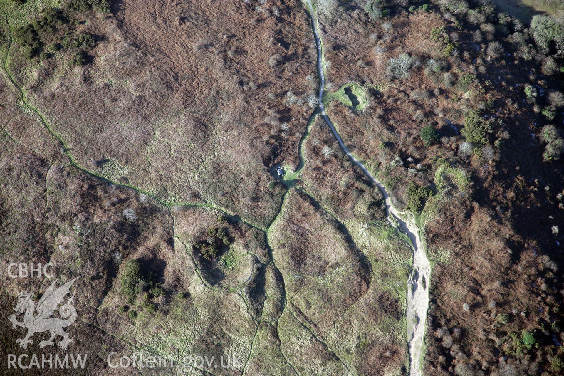 RCAHMW colour oblique photograph of Penmaen Burrows Burial Chamber. Taken by Toby Driver on 02/02/2012.