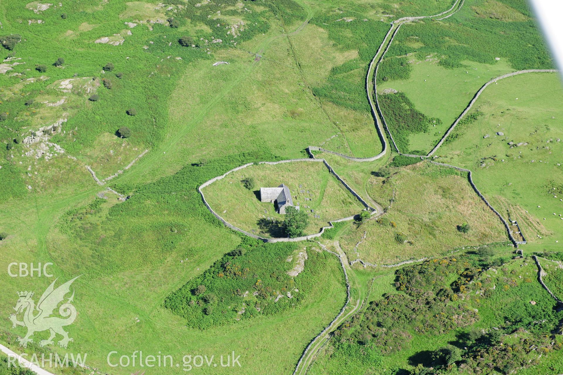 RCAHMW colour oblique photograph of St Celynin's Church, landscape view. Taken by Toby Driver on 10/08/2012.