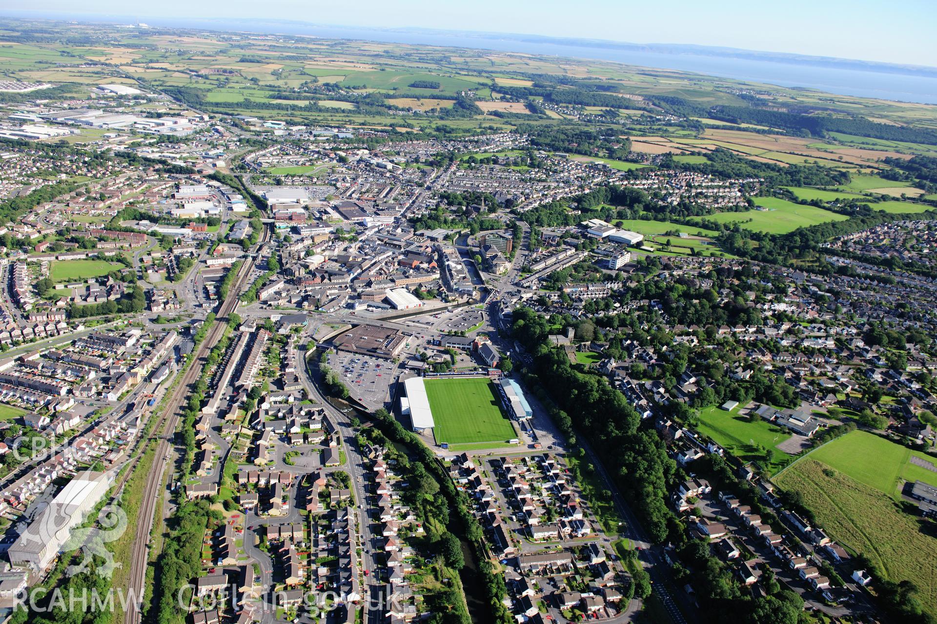 RCAHMW colour oblique photograph of Brewery Field Stadium, Bridgend. Taken by Toby Driver on 24/07/2012.