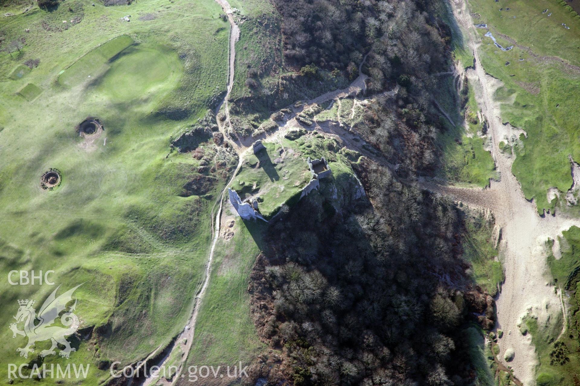 RCAHMW colour oblique photograph of Pennard deserted settlement and Pennard castle and church. Taken by Toby Driver on 02/02/2012.