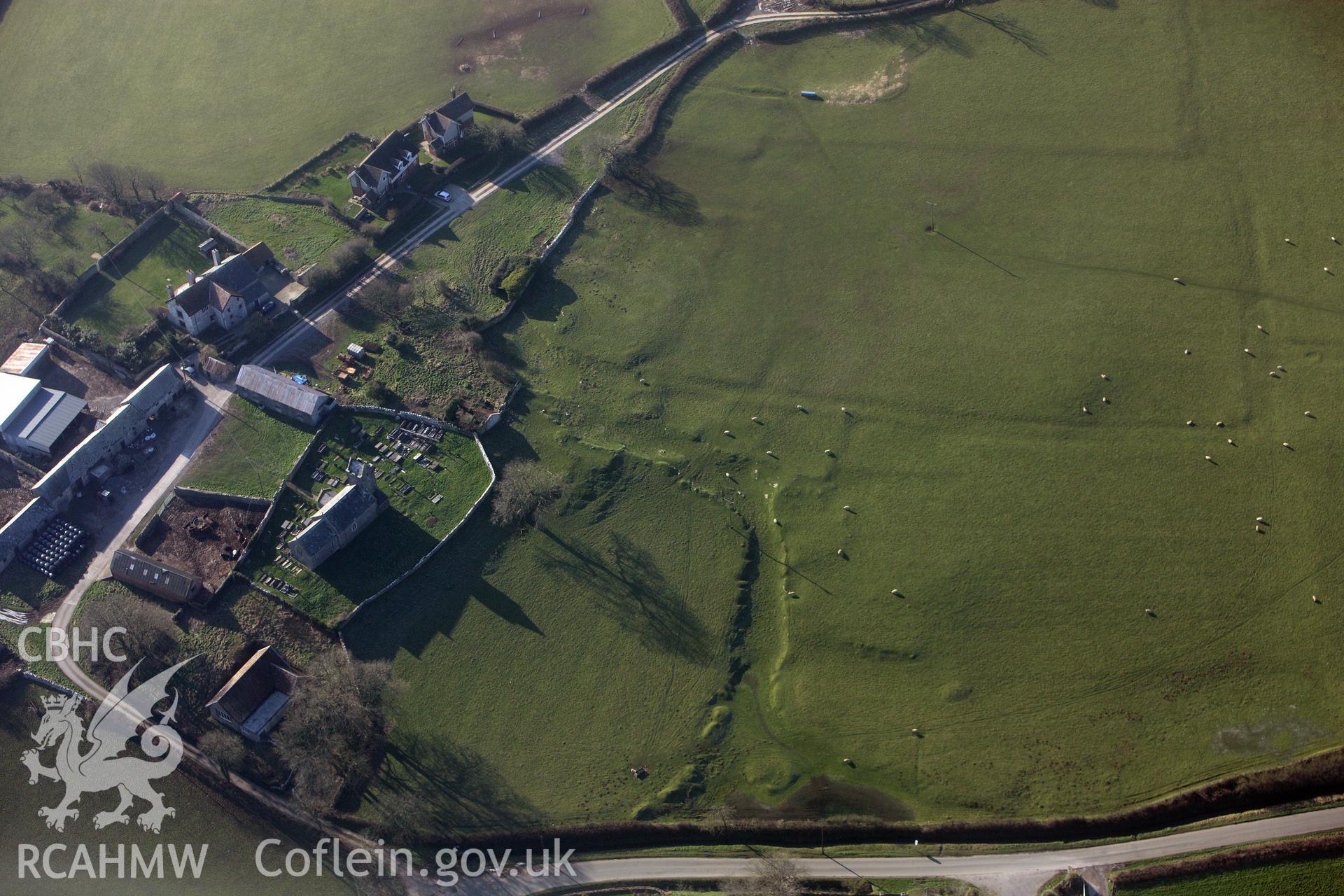 RCAHMW colour oblique photograph of Llanddewi  Earthworks. Taken by Toby Driver on 02/02/2012.