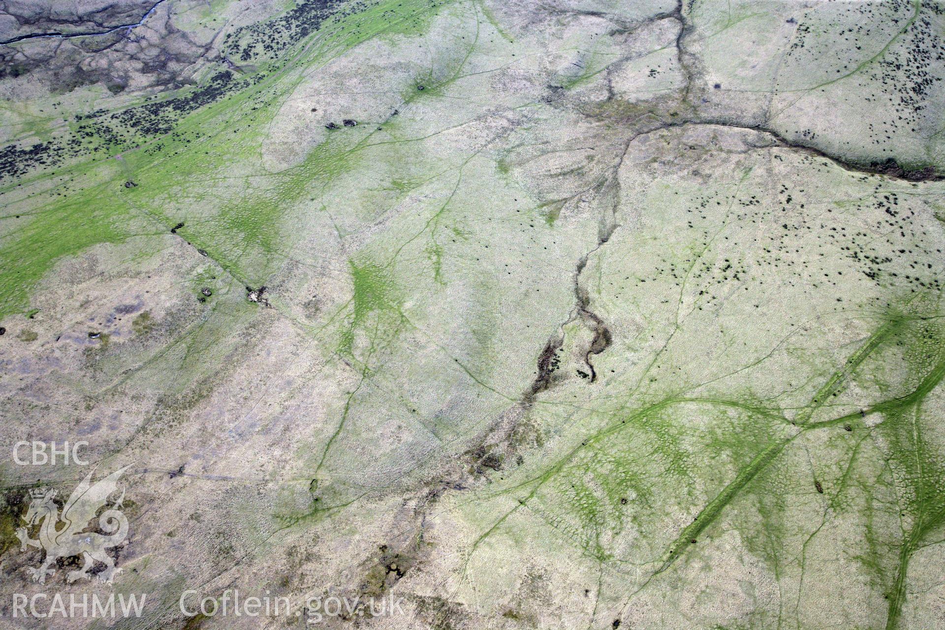 RCAHMW colour oblique photograph of Arhosfa'r Garreg Lwyd Roman marching camp. Taken by Toby Driver and Oliver Davies on 28/03/2012.