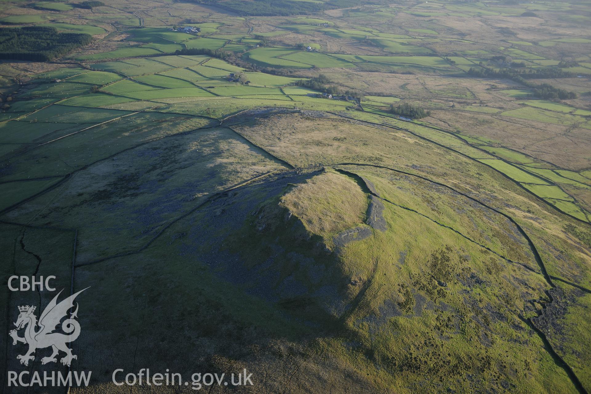 RCAHMW colour oblique photograph of Pen y Gaer hillfort. Taken by Toby Driver on 10/12/2012.