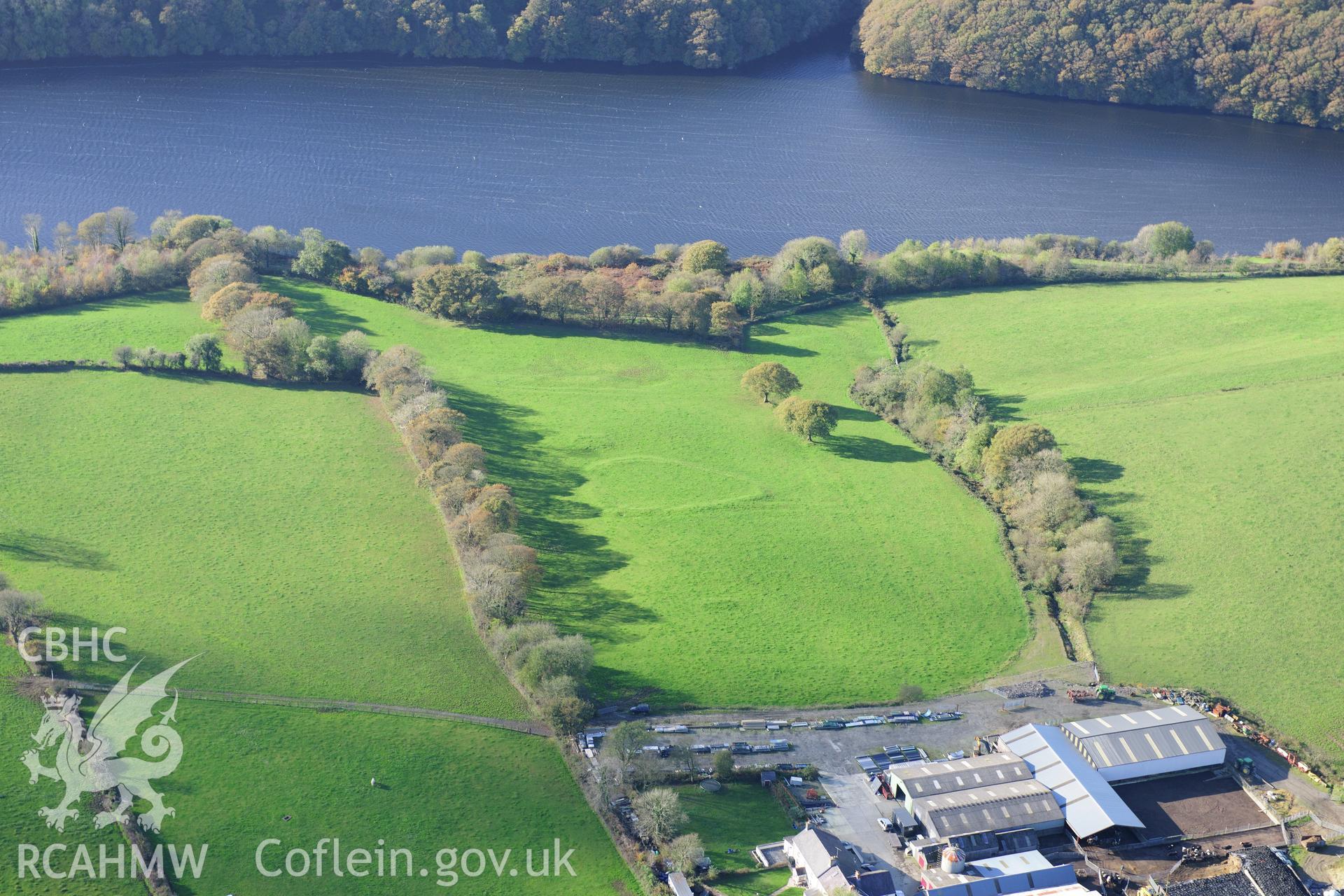 RCAHMW colour oblique photograph of Defended Velindre Enclosure, Llys Y Farn. Taken by Toby Driver on 26/10/2012.