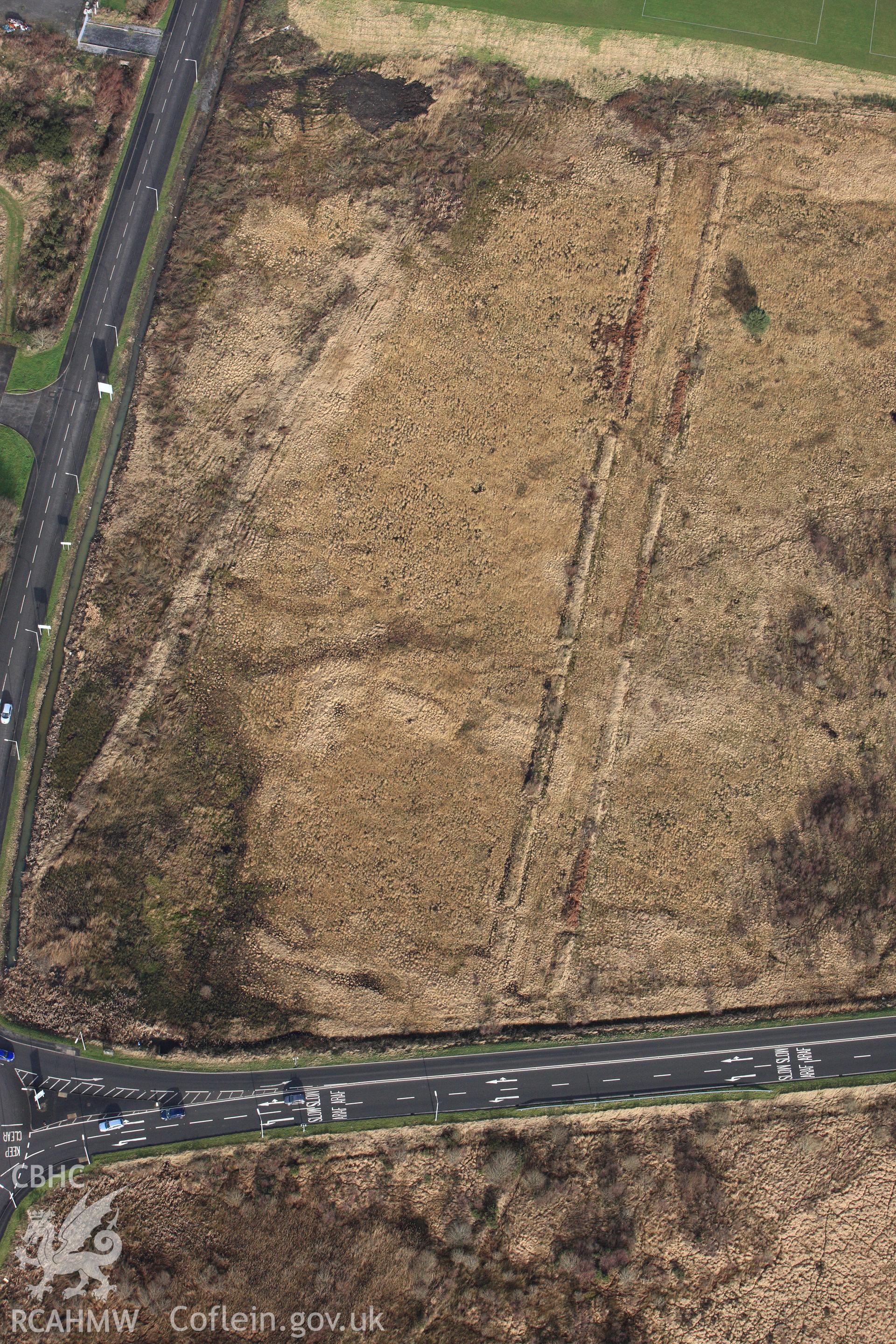 RCAHMW colour oblique photograph of Roman Military Enclosure on Stafford Common. Taken by Toby Driver on 27/01/2012.