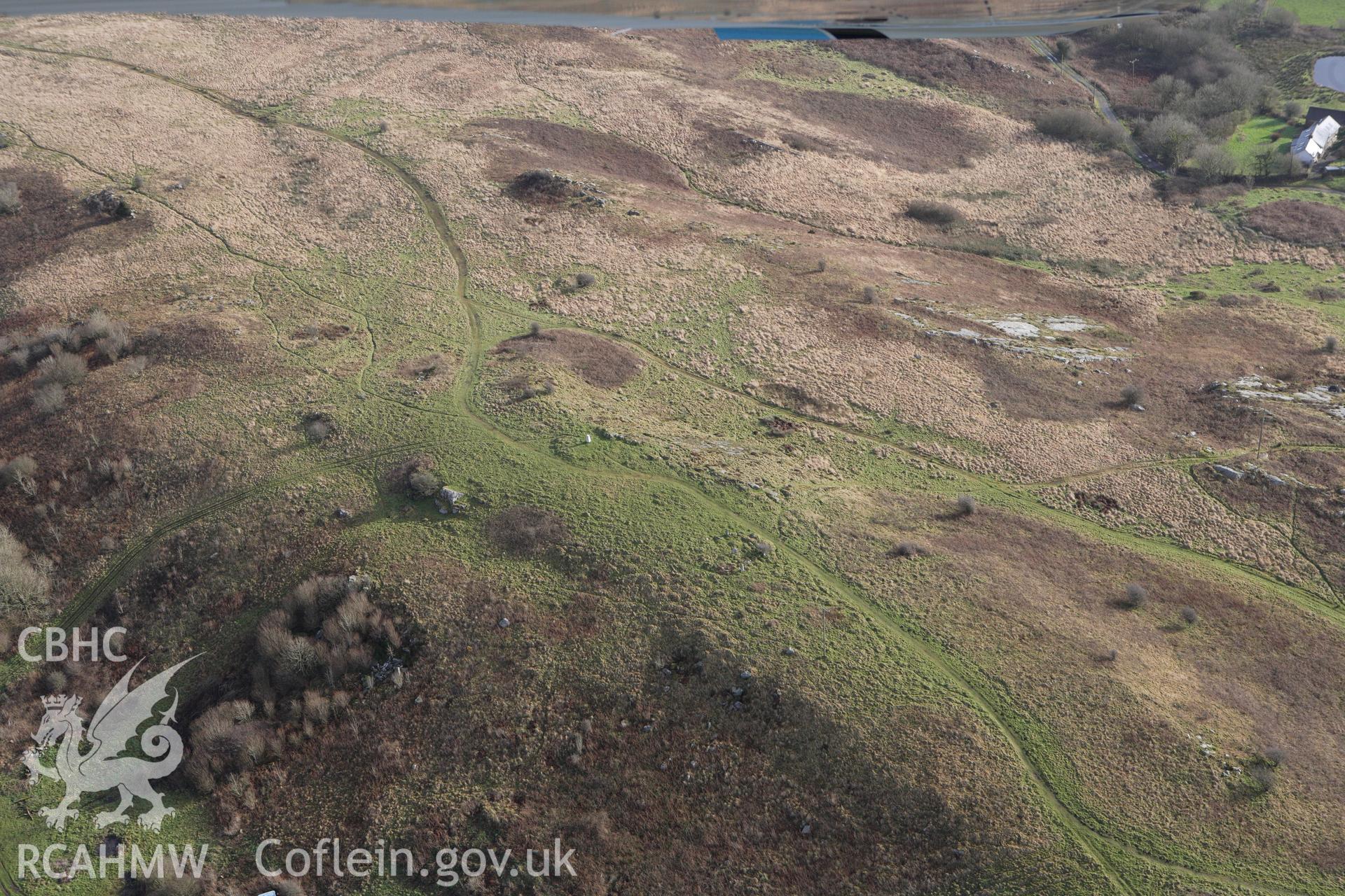 RCAHMW colour oblique photograph of Mynydd Llangyndeyrn, Round Cairns. Taken by Toby Driver on 27/01/2012.