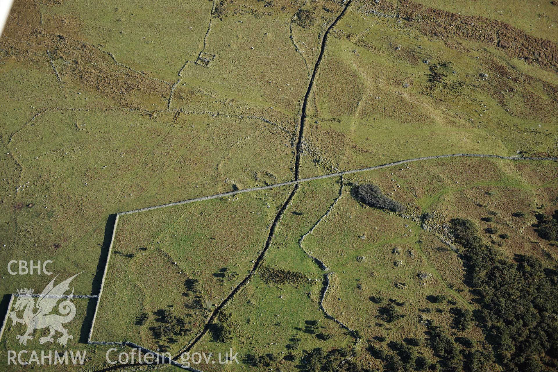 RCAHMW colour oblique photograph of Pont Fadog, hut circle settlement. Taken by Toby Driver on 10/12/2012.