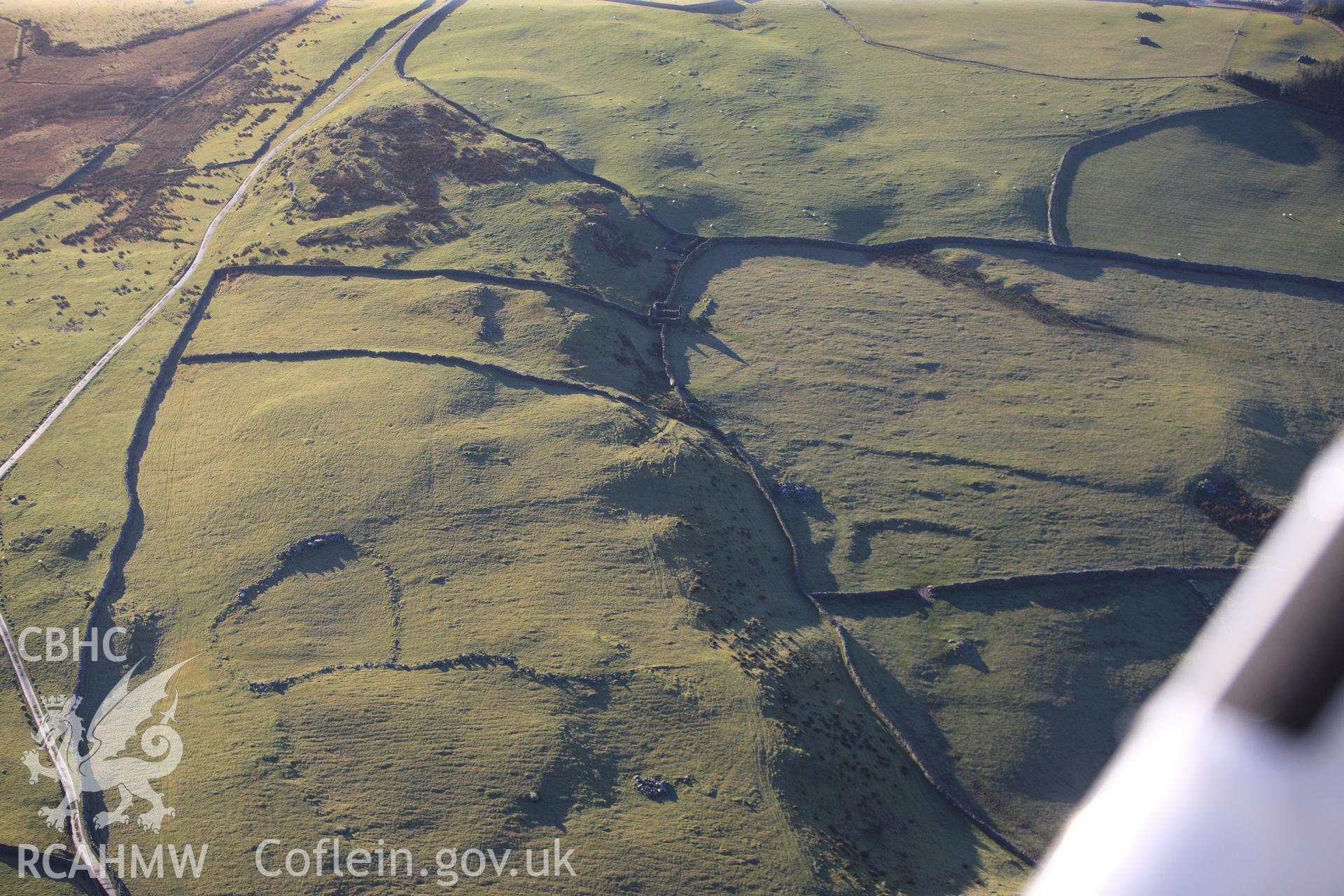 RCAHMW colour oblique photograph of Erw Wen, field system to south of homestead, and standing stone. Taken by Toby Driver on 10/12/2012.