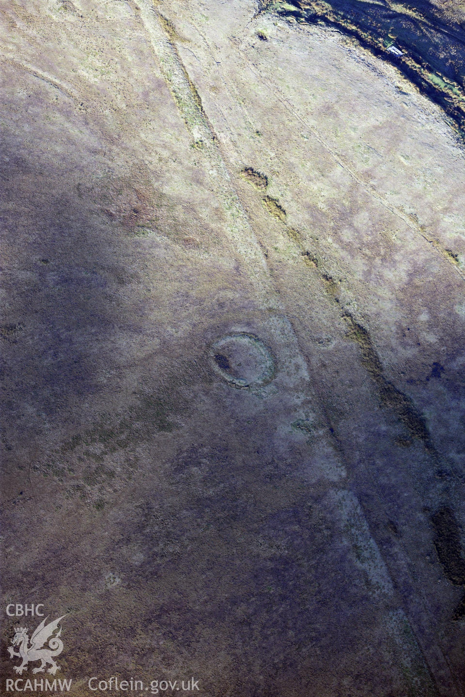 RCAHMW colour oblique photograph of Ring cairn on Tor Clawdd. Taken by Toby Driver on 28/11/2012.