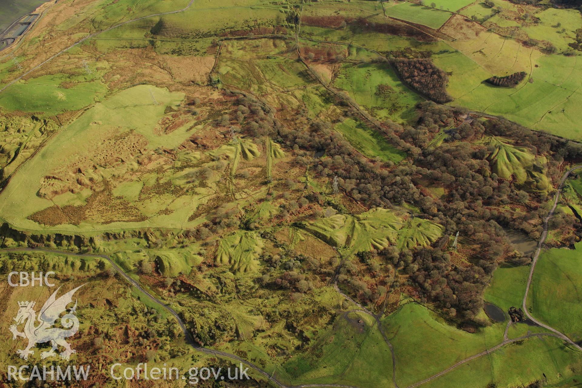 RCAHMW colour oblique photograph of Ironstone levels east of Plymouth Ironworks, industrial landscape. Taken by Toby Driver on 28/11/2012.