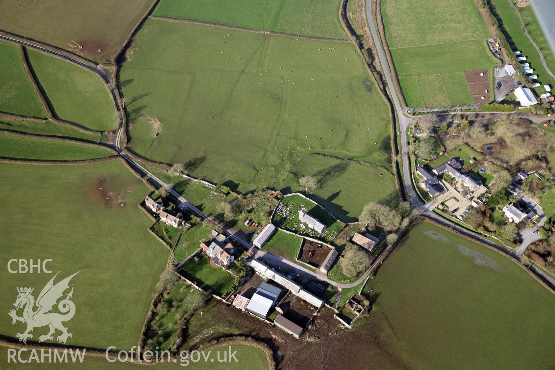 RCAHMW colour oblique photograph of Llanddewi Earthworks. Taken by Toby Driver on 02/02/2012.