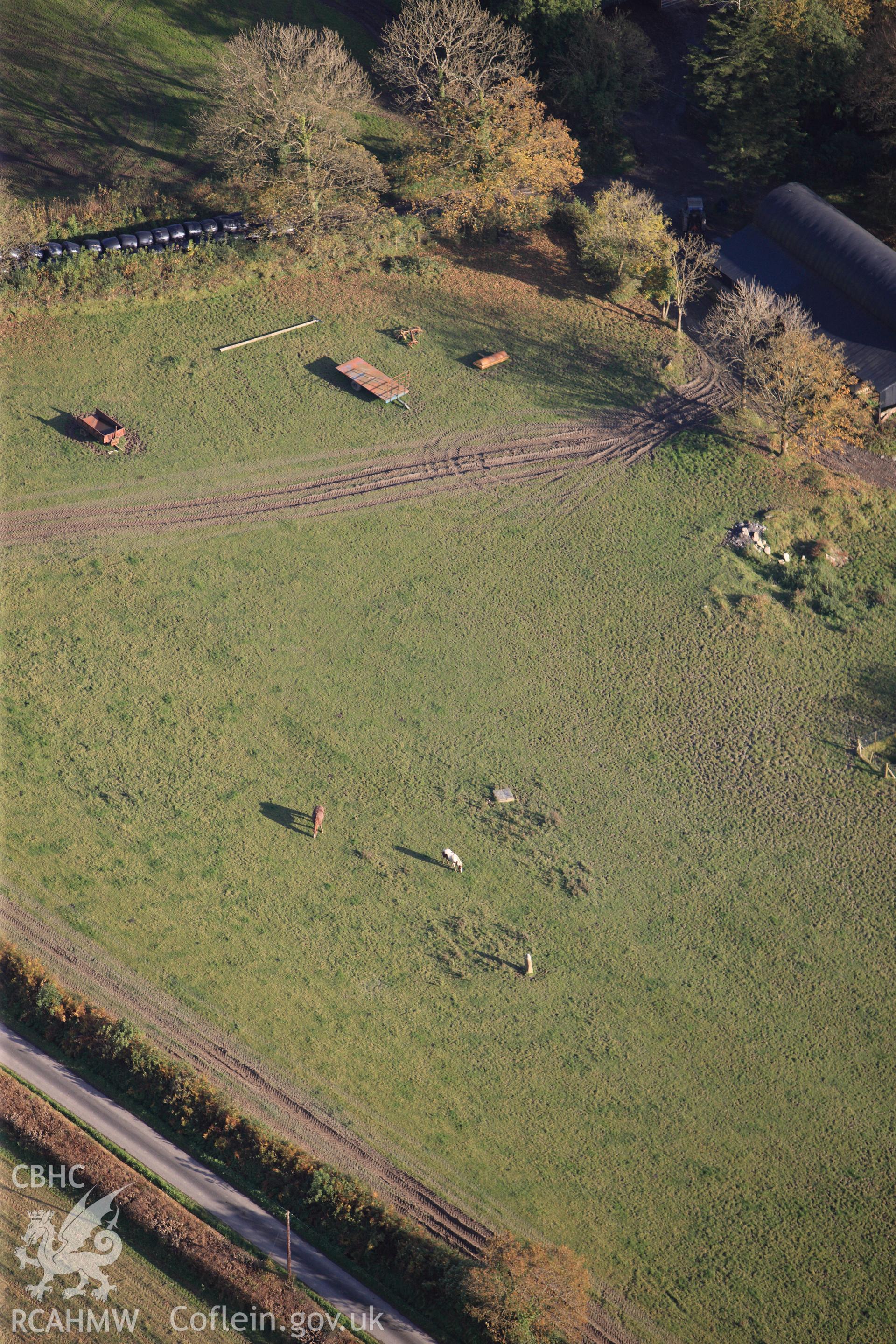 RCAHMW colour oblique photograph of Parciau stone; Qvenvendani Stone. Taken by Toby Driver on 26/10/2012.