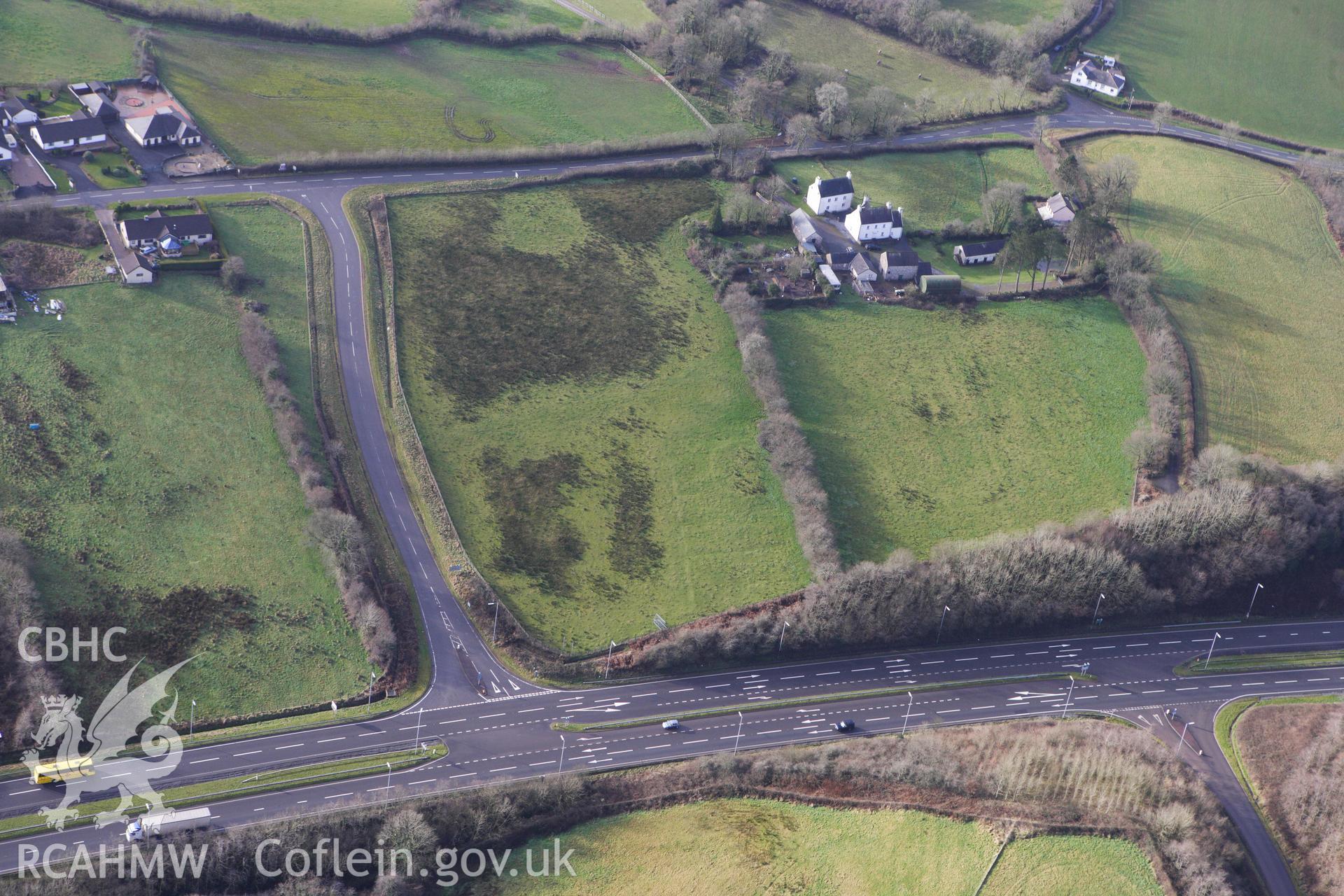 RCAHMW colour oblique photograph of Ring Cairn, north-east of Heol Ddu. Taken by Toby Driver on 27/01/2012.