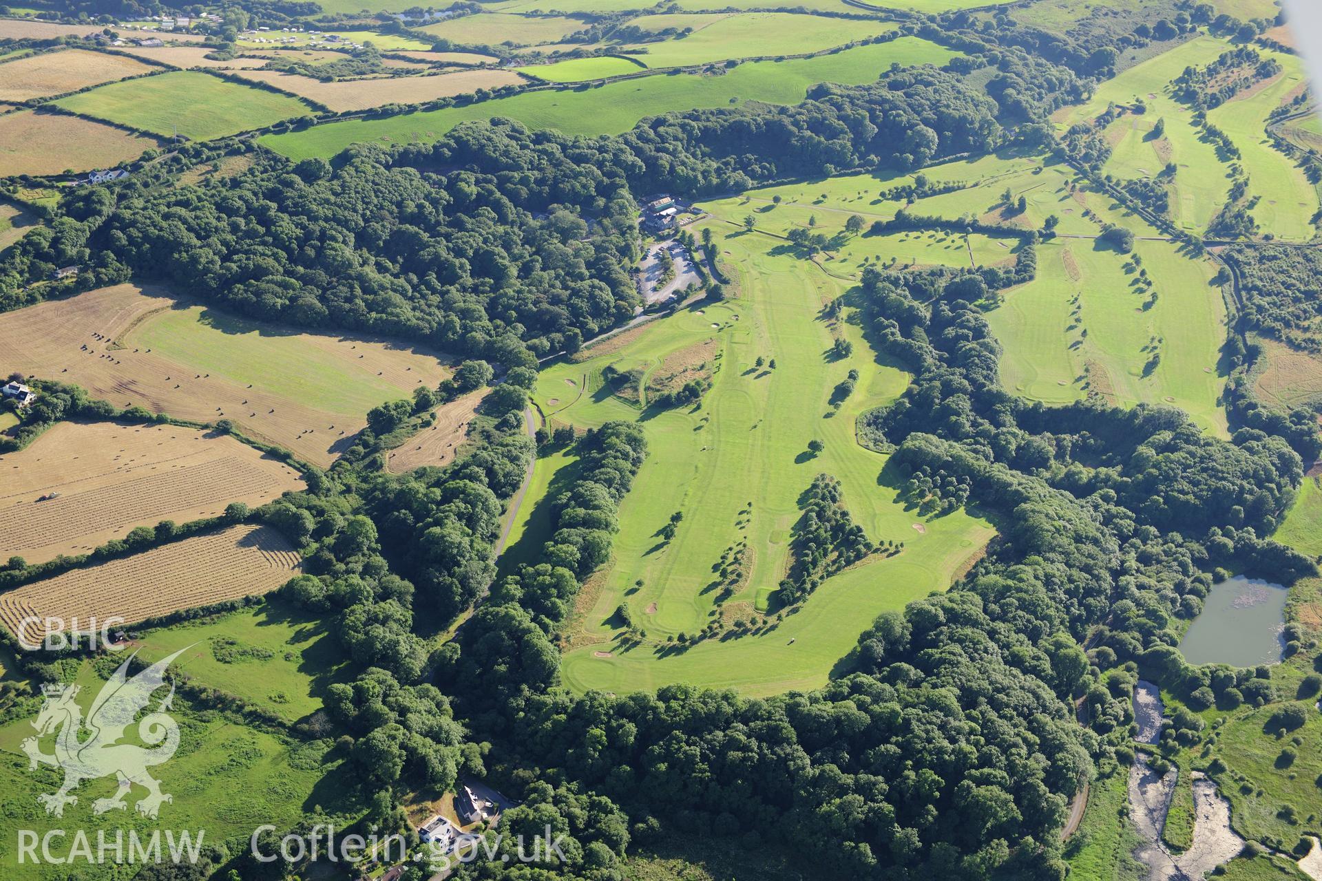 RCAHMW colour oblique photograph of Hoyle's Mouth Cave, and Little Hoyle, landscape. Taken by Toby Driver on 24/07/2012.