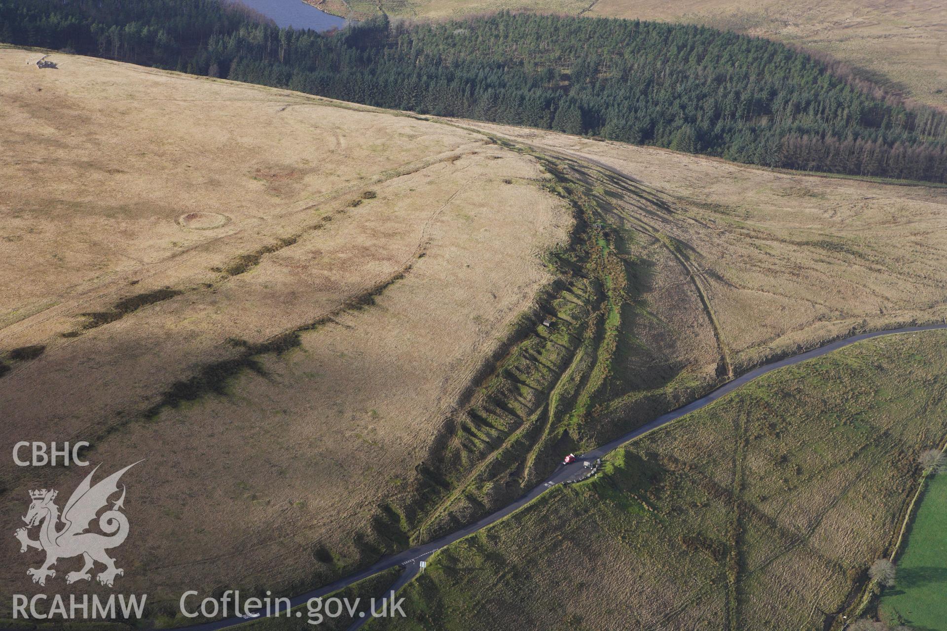 RCAHMW colour oblique photograph of Ring Cairn on Tor Clawdd, with Tor Clawdd Causeway. Taken by Toby Driver on 27/01/2012.