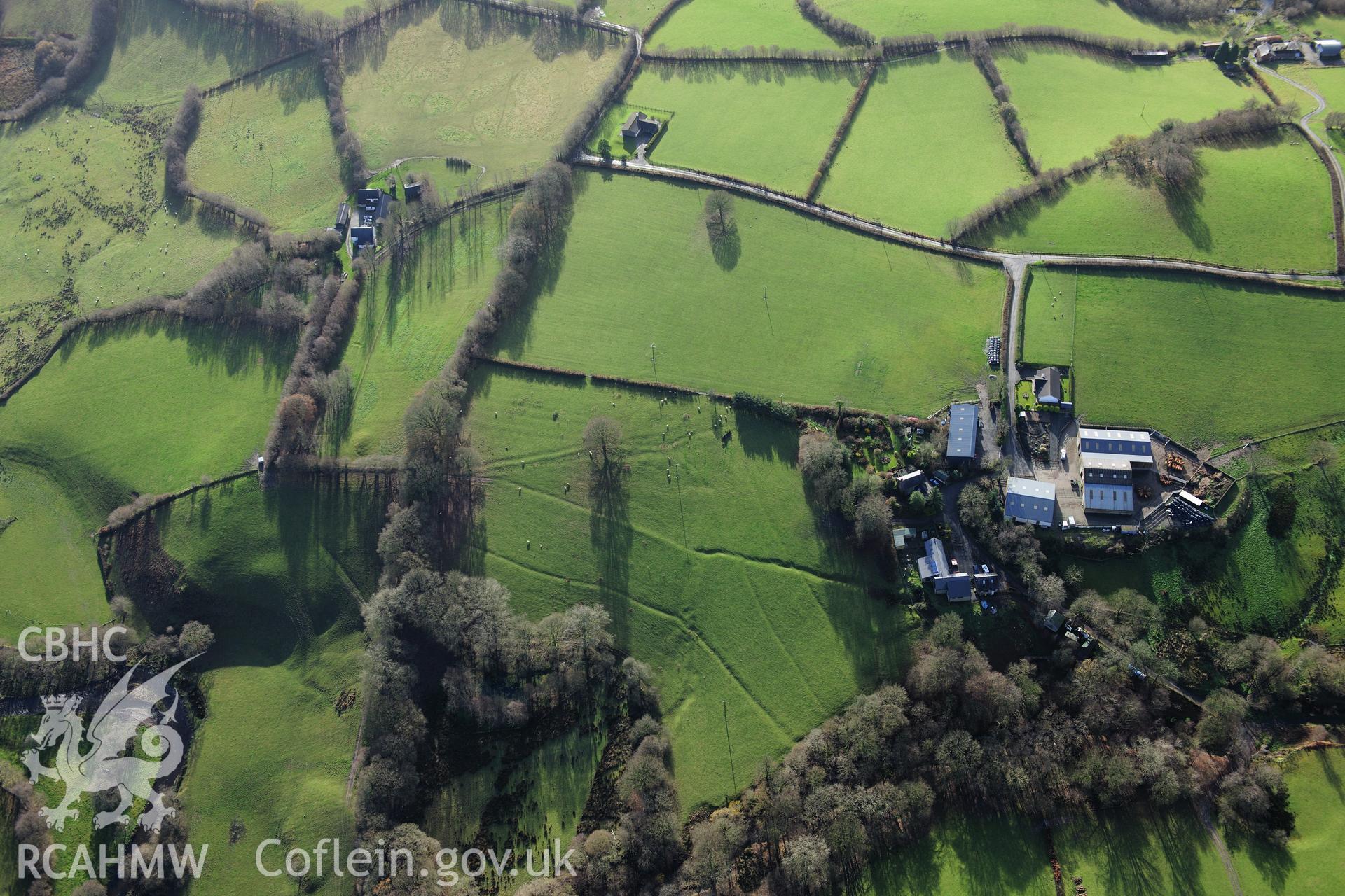 RCAHMW colour oblique photograph of Pen y Grug Pond Bay, earthworks of leat systems on hillslope to south-west. Taken by Toby Driver on 23/11/2012.