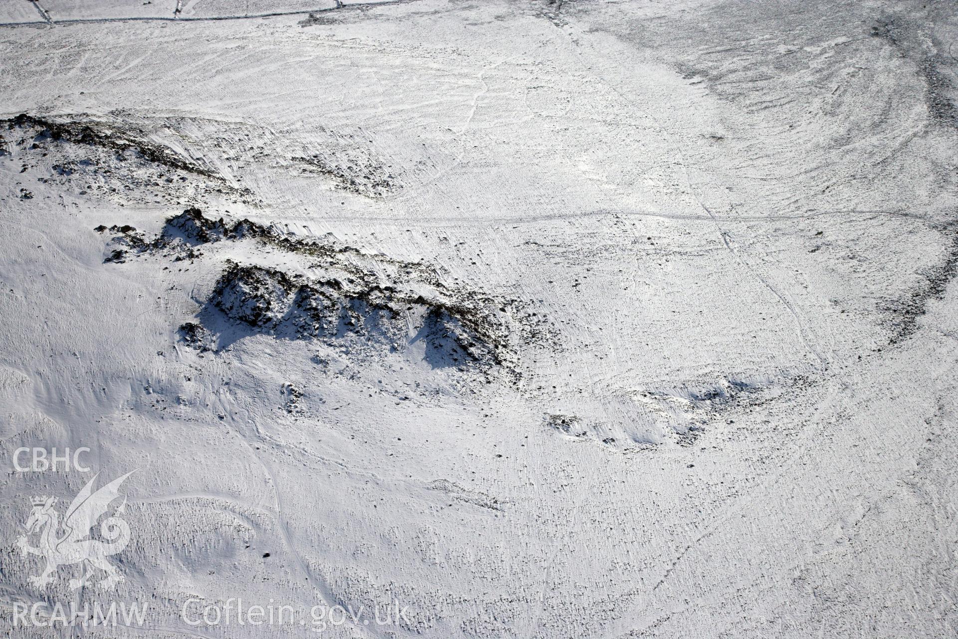 RCAHMW colour oblique photograph of Carn Meini Bluestone Outcrops of Spotted Dolerite. Taken by Toby Driver on 02/02/2012.