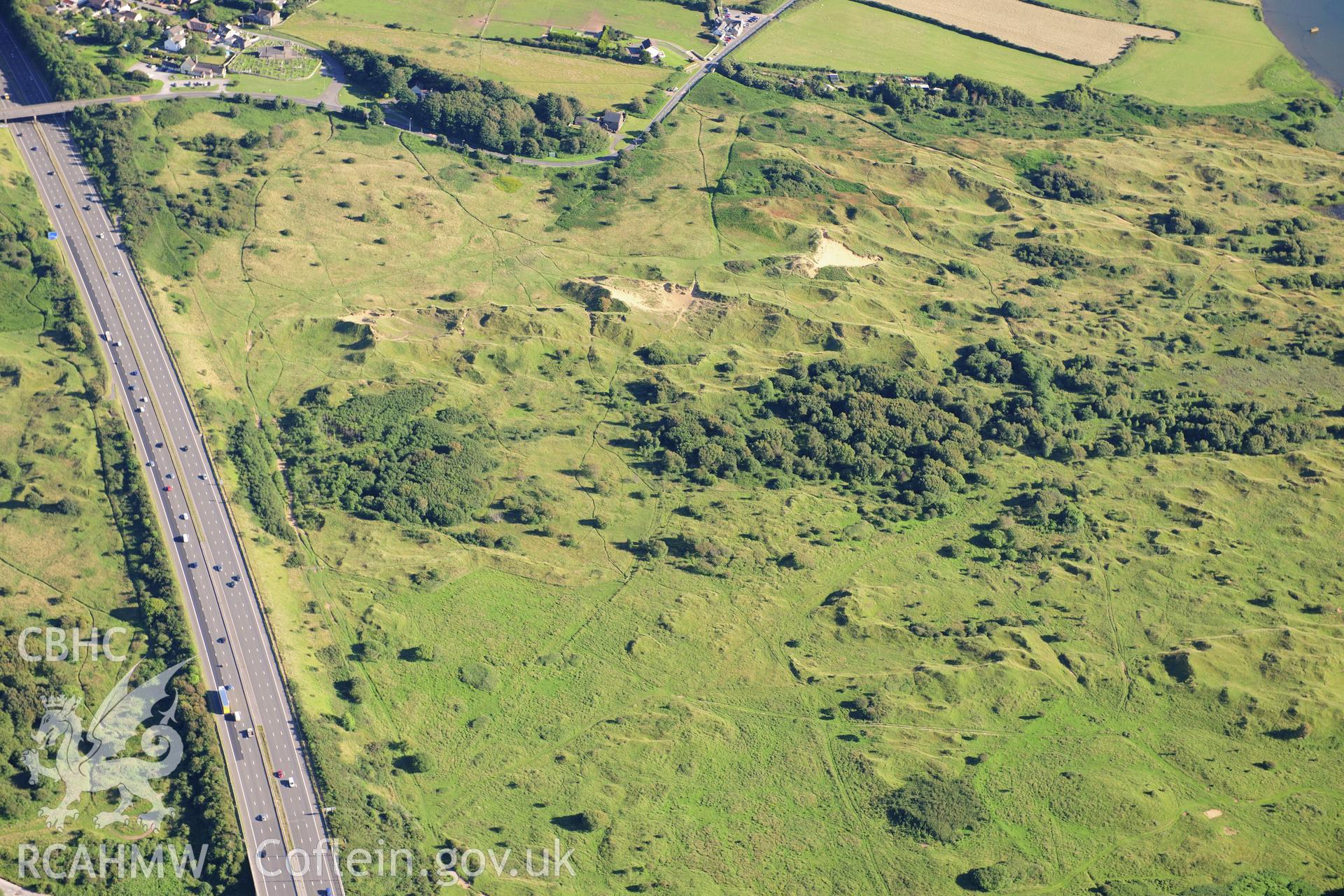 RCAHMW colour oblique photograph of Kenfig Medieval Borough. Taken by Toby Driver on 24/07/2012.