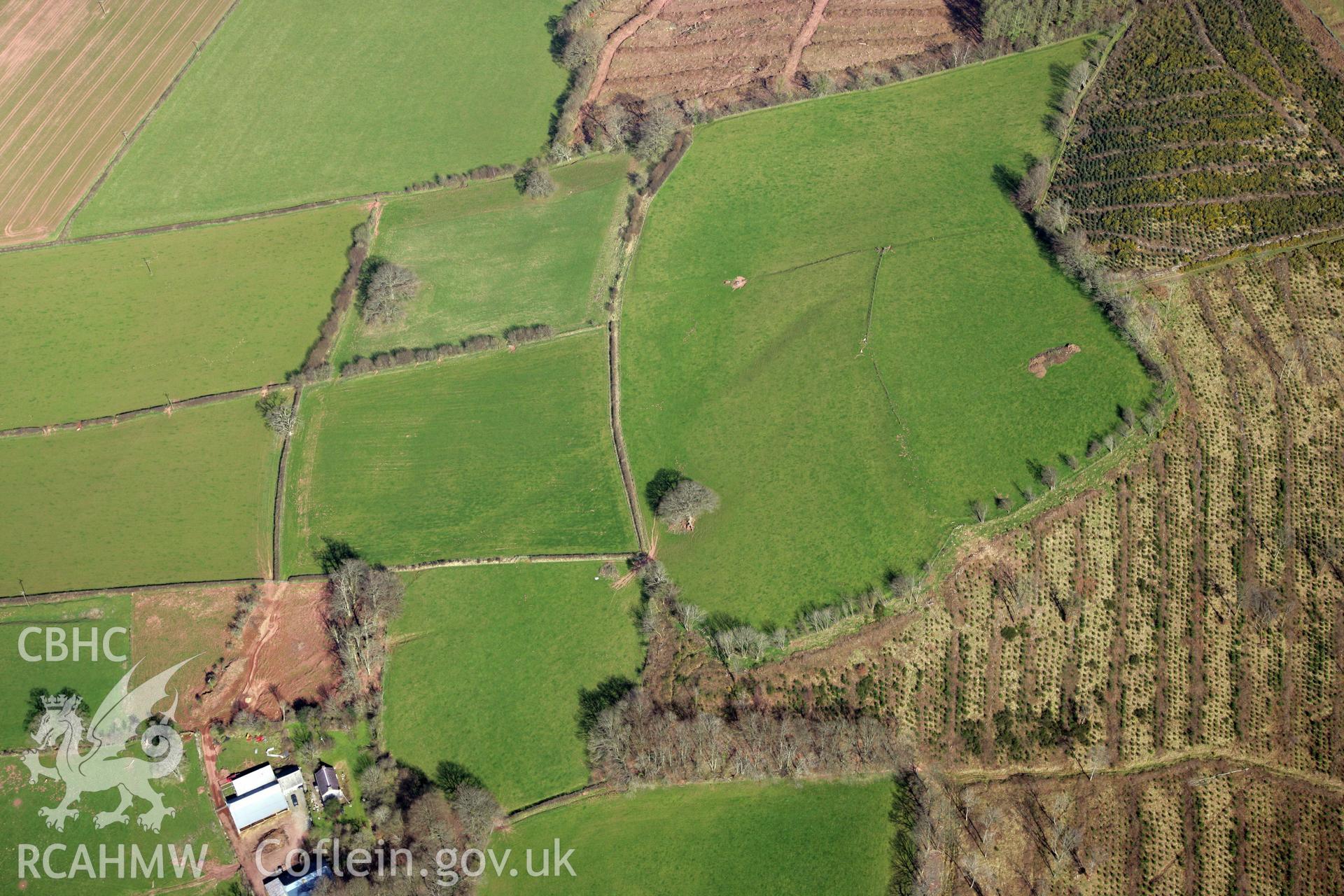 RCAHMW colour oblique photograph of Penpont-fach, denuded hillfort west of Twyn y Gaer hillfort. Taken by Toby Driver and Oliver Davies on 28/03/2012.