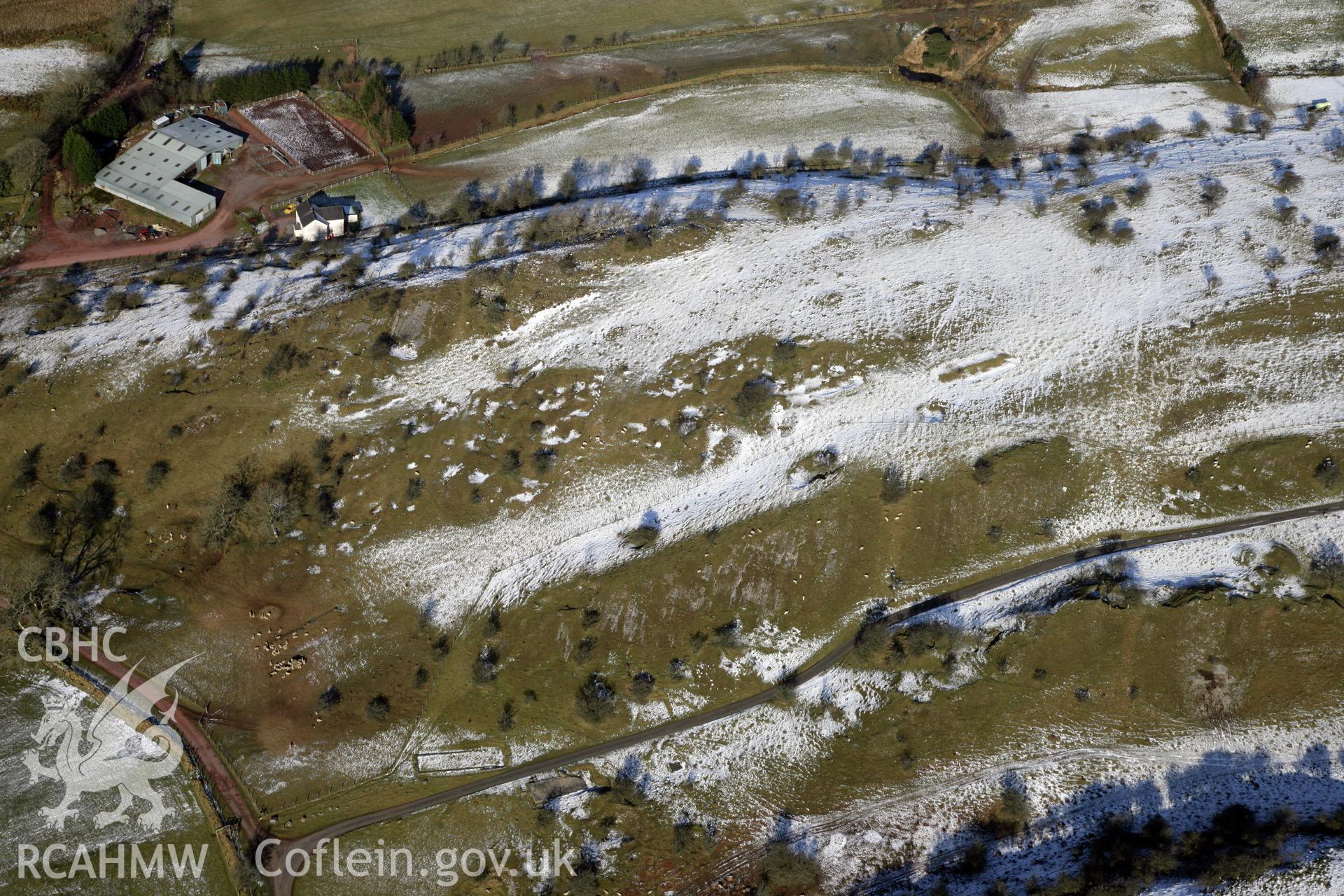 RCAHMW colour oblique photograph of Beddau'r Derwyddon Pillow Mound B. Taken by Toby Driver on 02/02/2012.