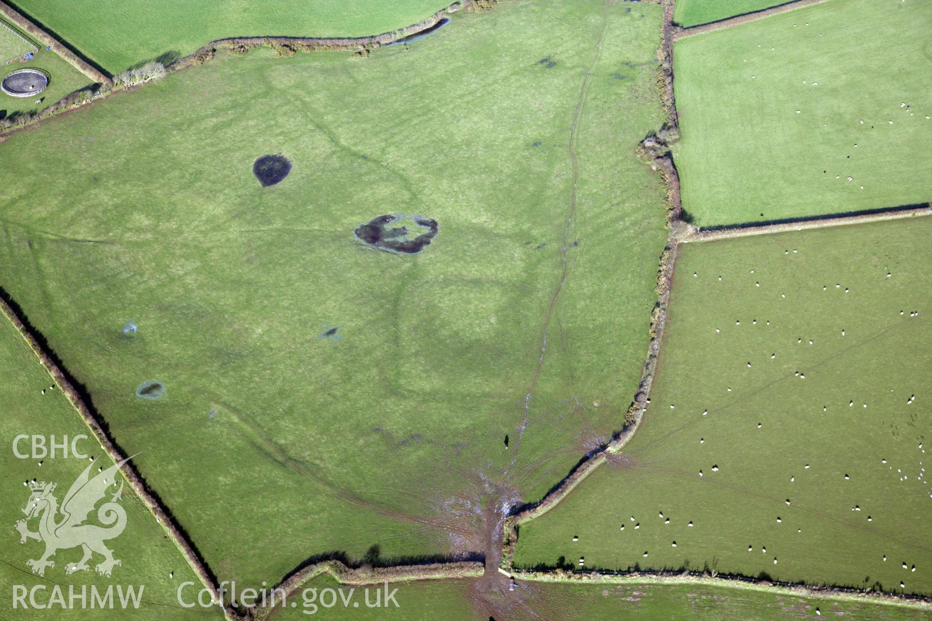 RCAHMW colour oblique photograph of Llanddewi Enclosure. Taken by Toby Driver on 02/02/2012.