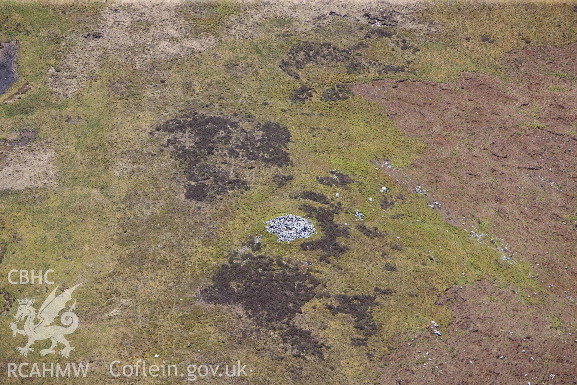 RCAHMW colour oblique photograph of Tair Carn Isaf, cairn A. Taken by Toby Driver on 22/05/2012.