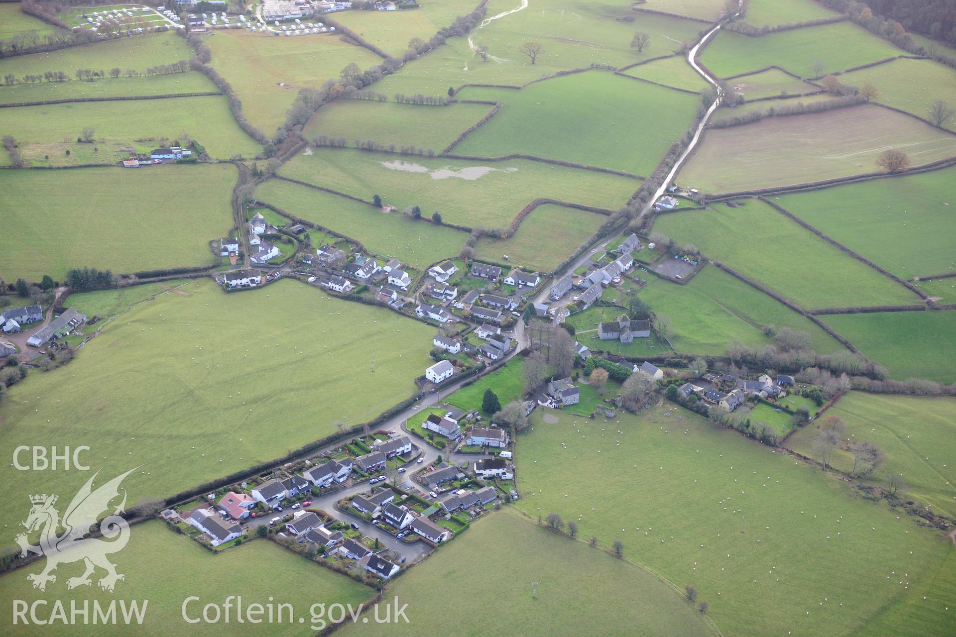 RCAHMW colour oblique photograph of Llanddew, with earthworks. Taken by Toby Driver on 23/11/2012.