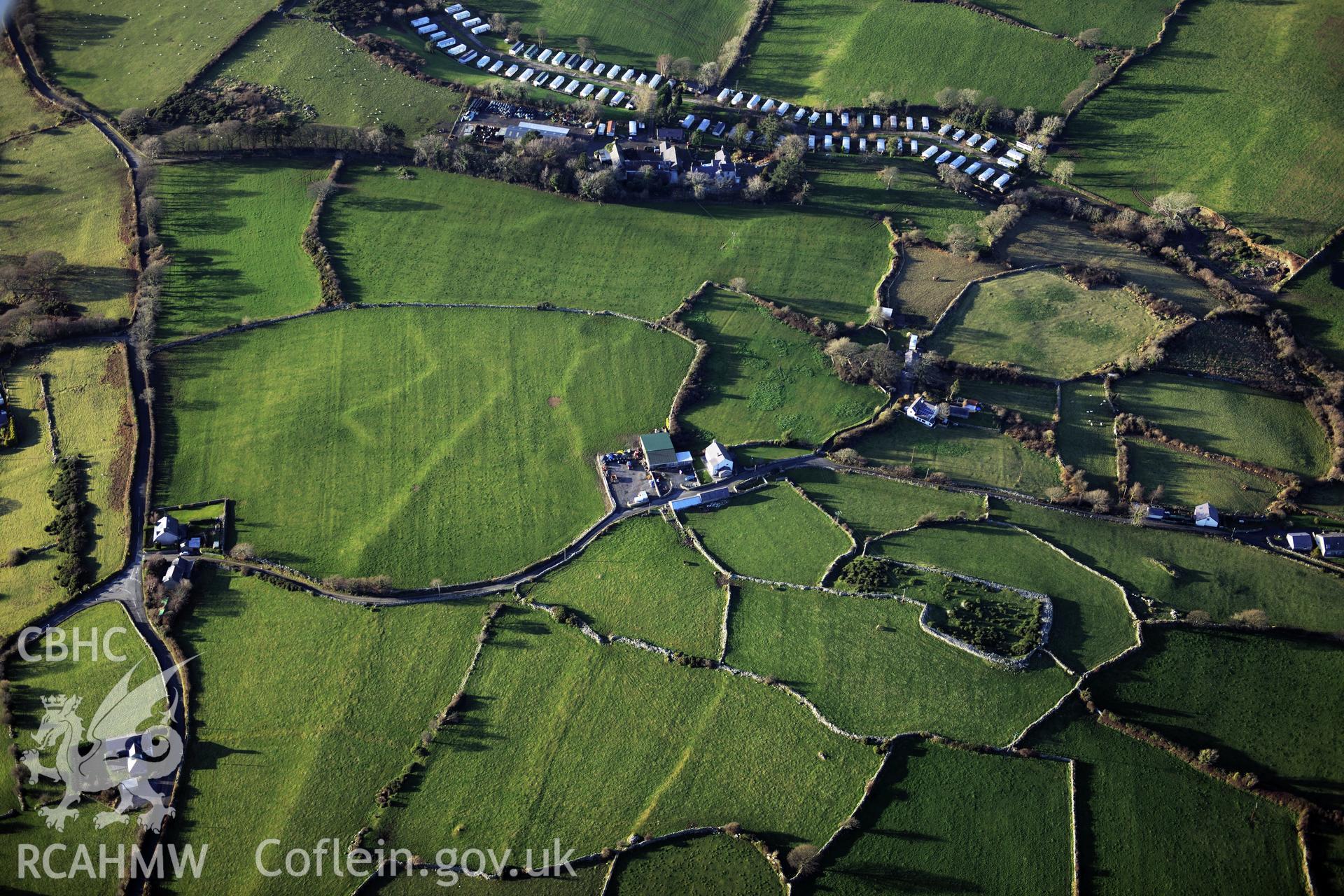 RCAHMW colour oblique photograph of Caer, Pen y Gaer, Glascoed, and field systems. Taken by Toby Driver on 10/12/2012.