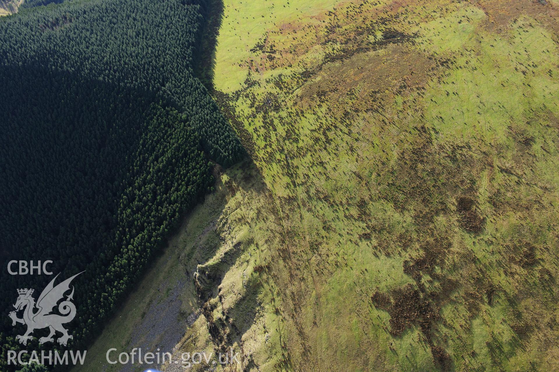 RCAHMW colour oblique photograph of Clawdd Mawr, Mynydd Caerau dyke, missed target. Taken by Toby Driver on 28/11/2012.