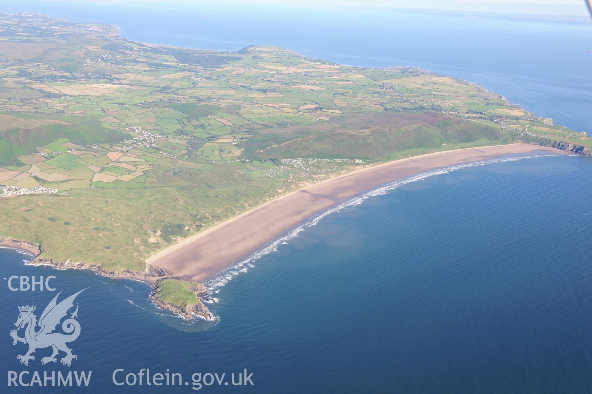 RCAHMW colour oblique photograph of West Gower, high landscape view over Rhossili Bay. Taken by Toby Driver on 24/07/2012.