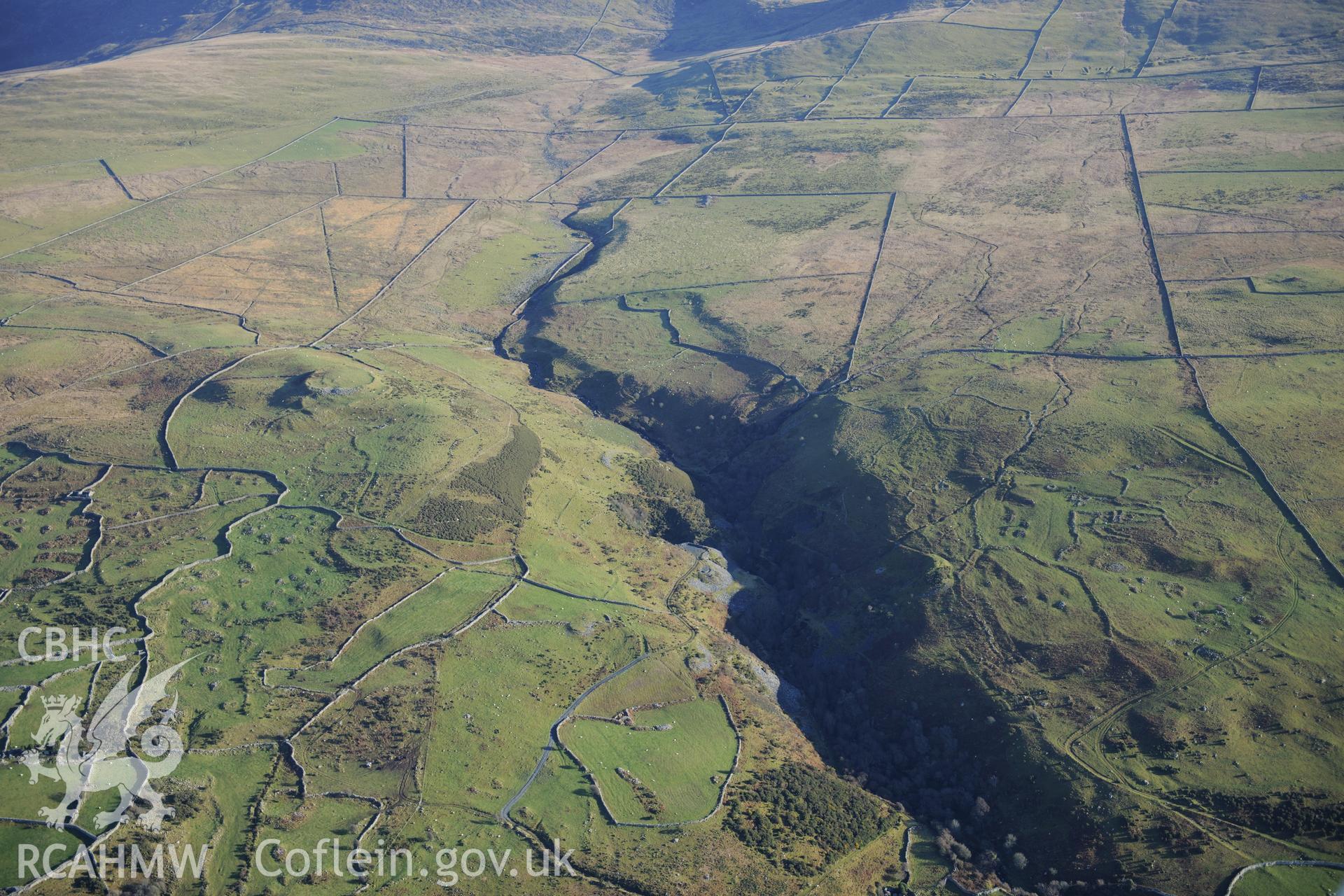 RCAHMW colour oblique photograph of Mynydd Egryn, settlement and field system, view from west. Taken by Toby Driver on 10/12/2012.