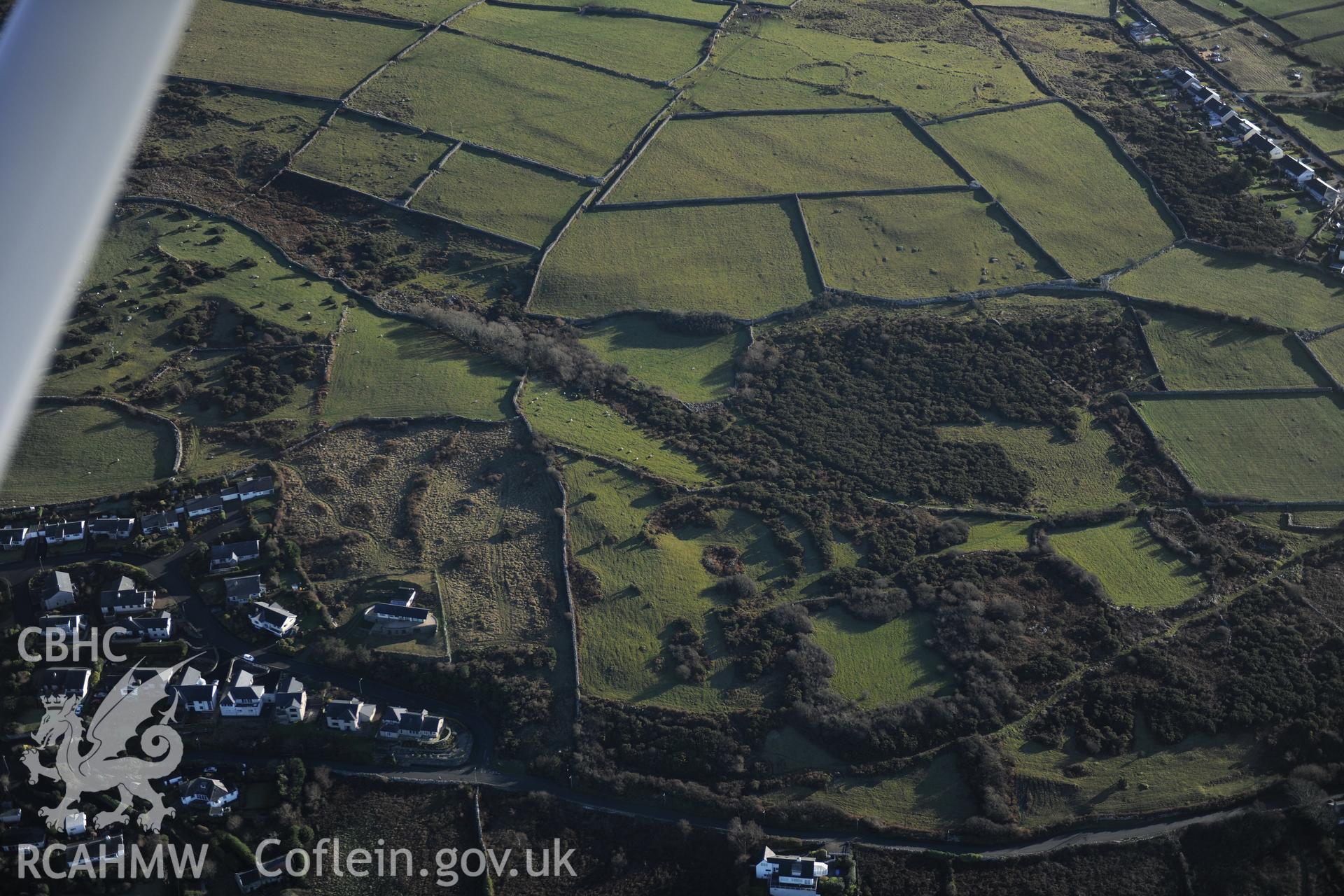 RCAHMW colour oblique photograph of Groes Las prehistoric settlement and field system. Taken by Toby Driver on 10/12/2012.