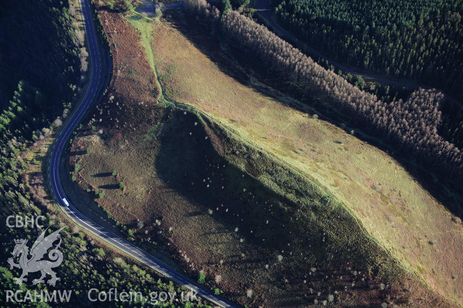 RCAHMW colour oblique photograph of Sugarloaf hillfort. Taken by Toby Driver on 23/11/2012.