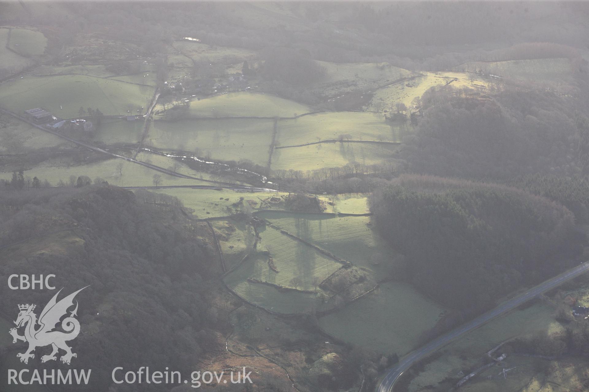 RCAHMW colour oblique photograph of Hut circle east of Cymerau Uchaf. Taken by Toby Driver on 13/01/2012.