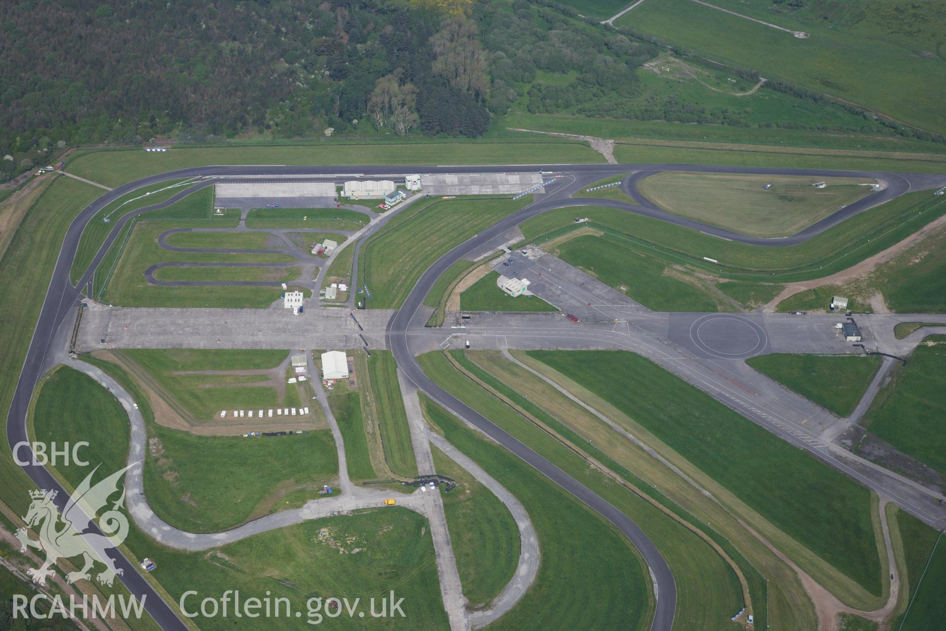 RCAHMW colour oblique photograph of General view of Pembrey airfield, looking north west. Taken by Toby Driver on 24/05/2012.