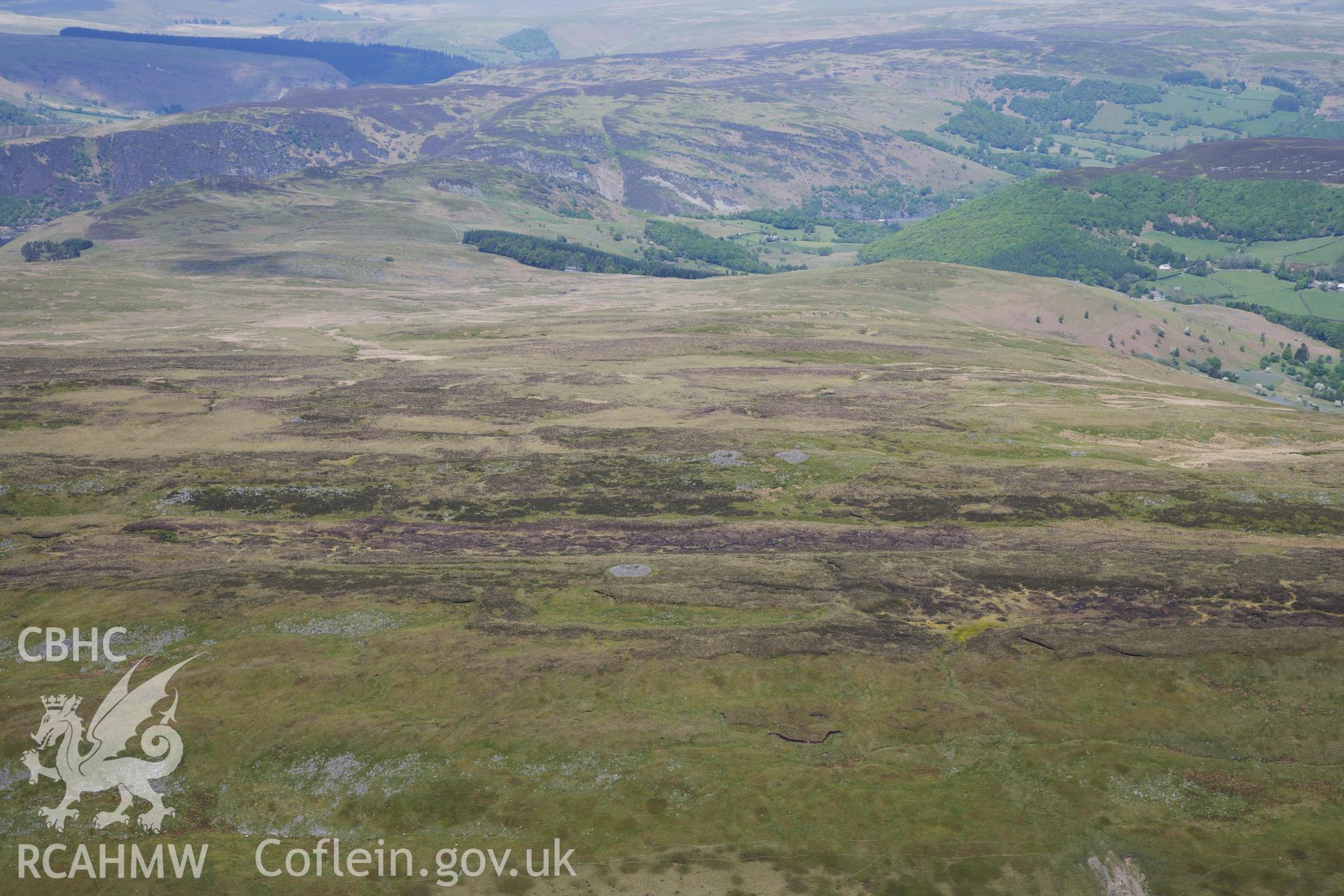 RCAHMW colour oblique photograph of Landscape view of Three Round Cairns on Gamriw. Taken by Toby Driver on 28/05/2012.