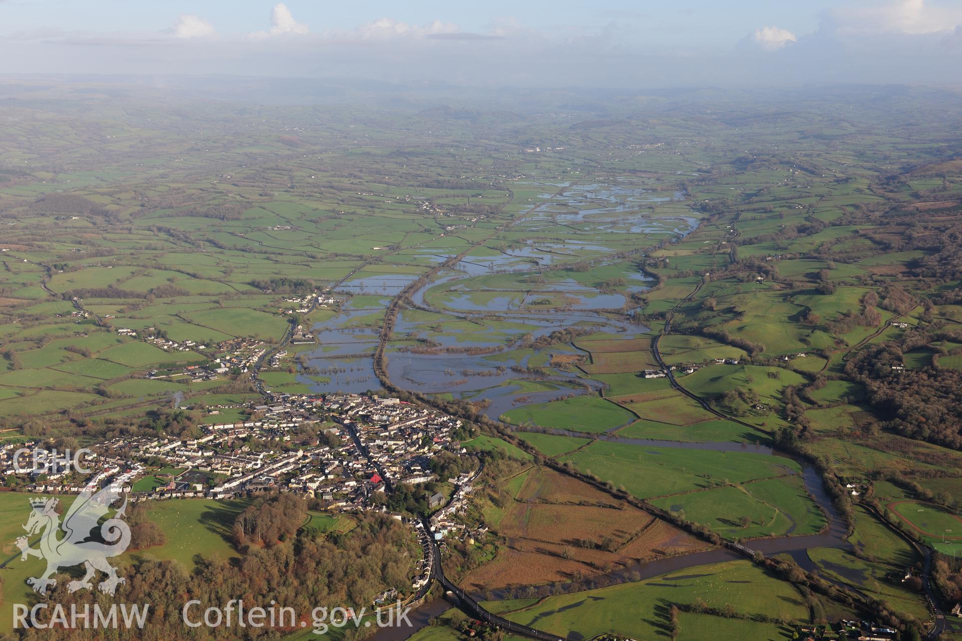 RCAHMW colour oblique photograph of Llandeilo, winter landscape from south-west with flooding. Taken by Toby Driver on 23/11/2012.