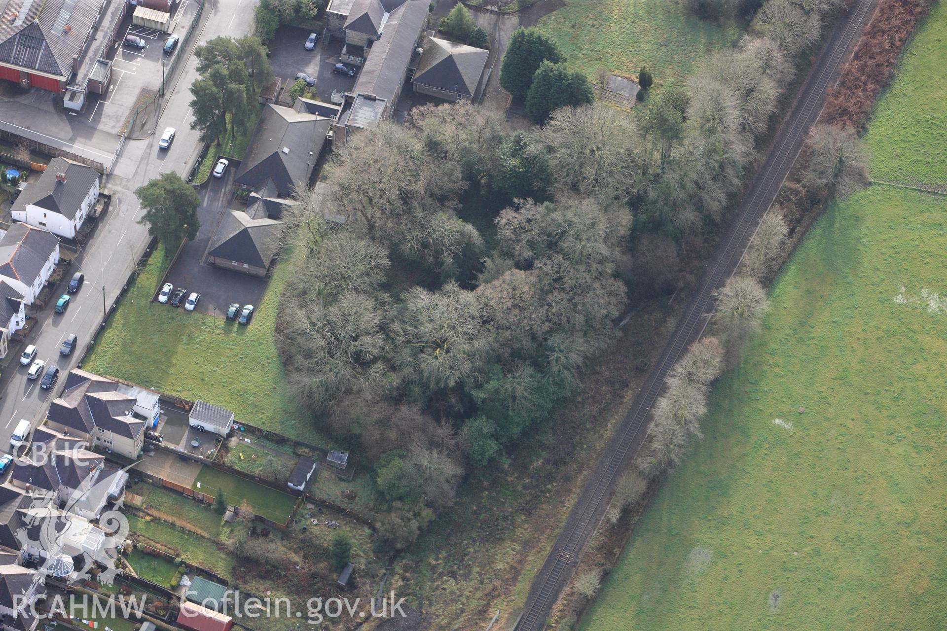 RCAHMW colour oblique photograph of Tir-y-Dail, motte and bailey, Ammanford. Taken by Toby Driver on 27/01/2012.