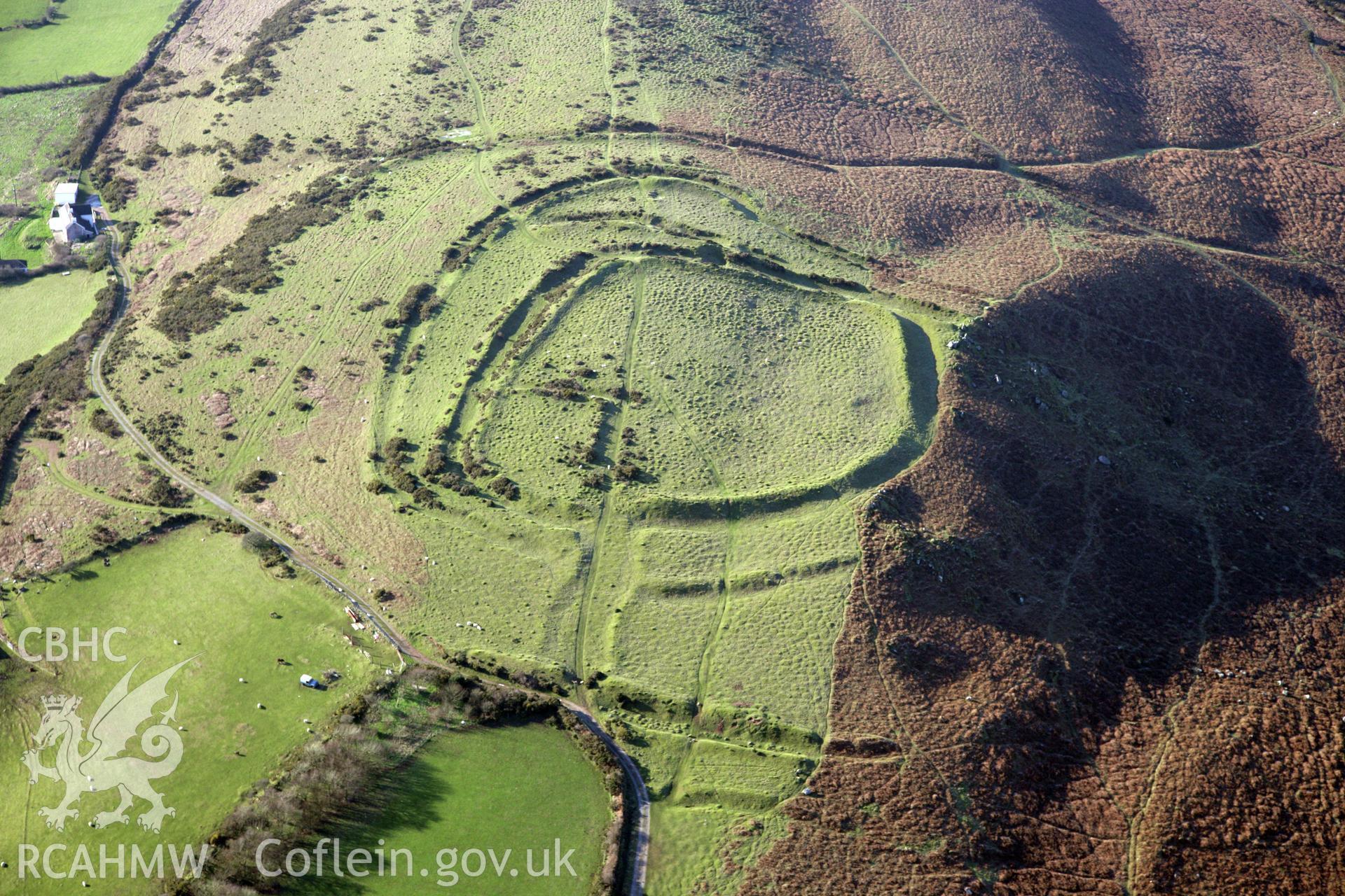 RCAHMW colour oblique photograph of The Bulwark, Llanmadoc Hill. Taken by Toby Driver on 02/02/2012.