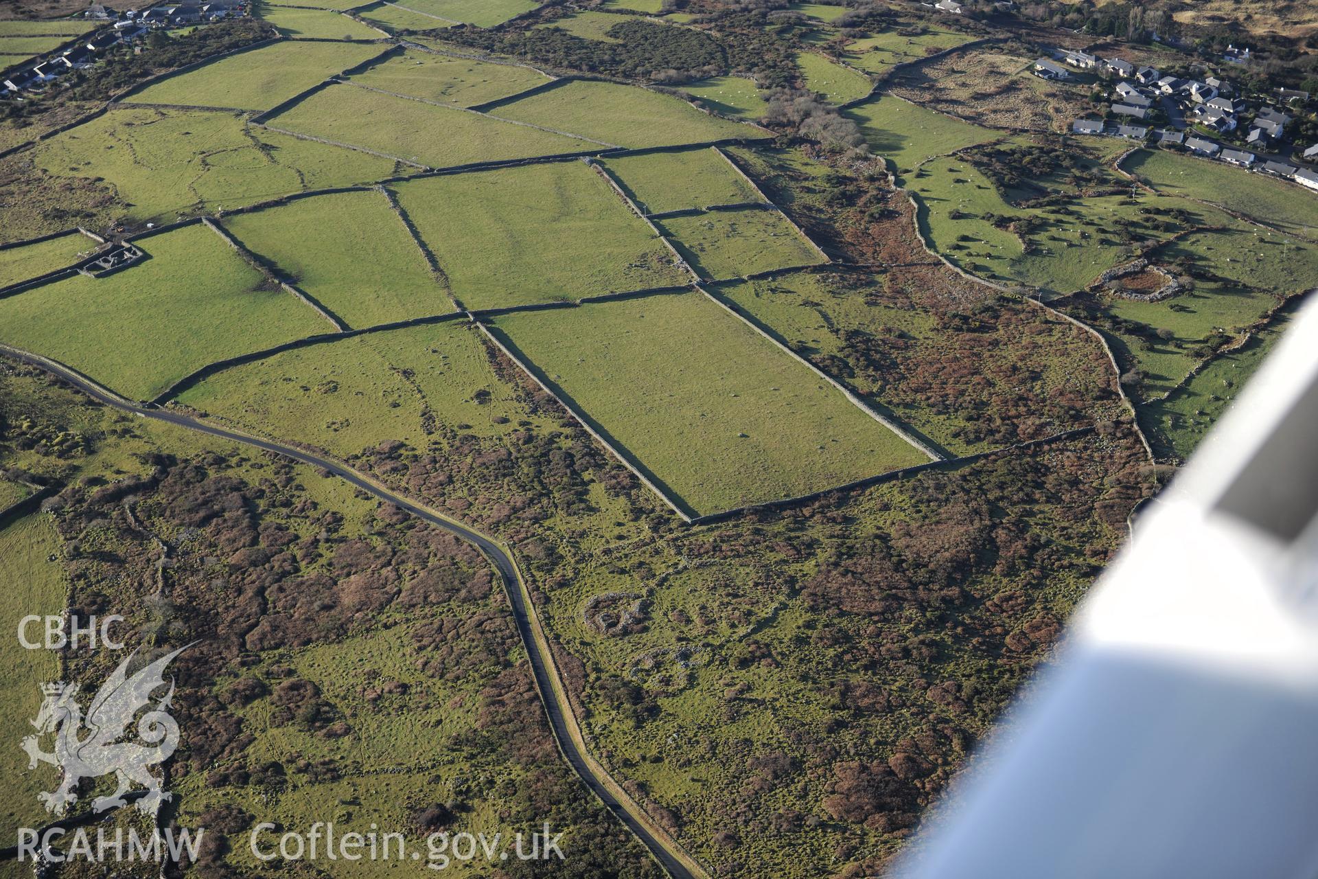 RCAHMW colour oblique photograph of Muriau'r Gwyddelod settlement complex and field system. Taken by Toby Driver on 10/12/2012.