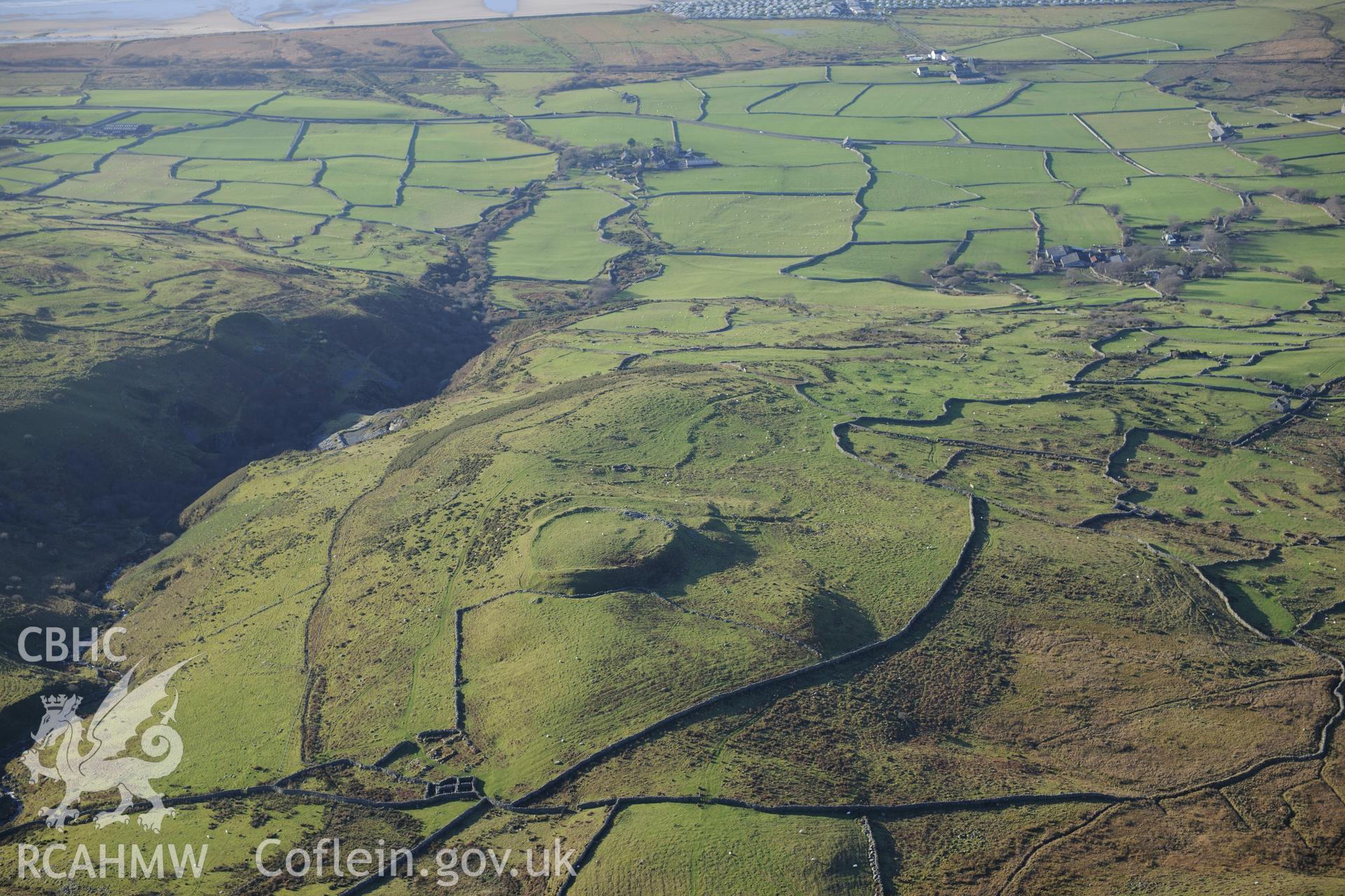 RCAHMW colour oblique photograph of Pen y Dinas, hillfort and upland landscape. Taken by Toby Driver on 10/12/2012.