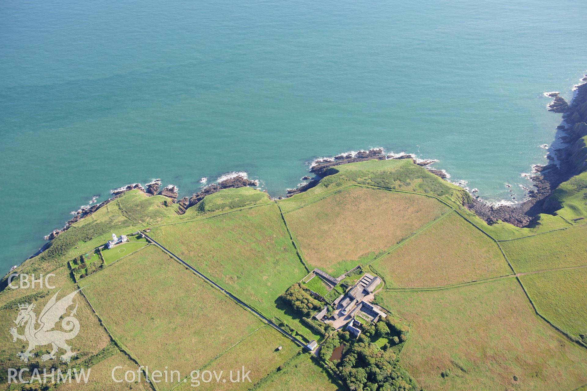 RCAHMW colour oblique photograph of Caldey Monastery, and lighthouse. Taken by Toby Driver on 24/07/2012.