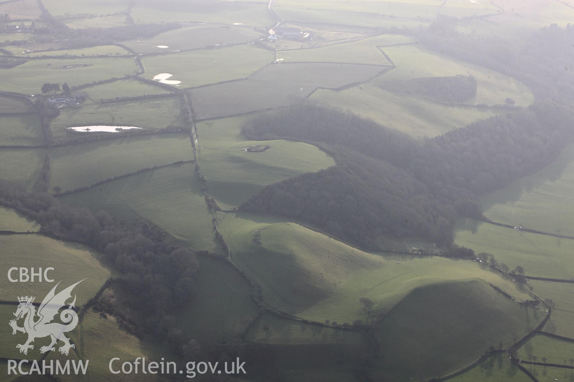 RCAHMW colour oblique photograph of Castell Mawr and Castell Bach, view from north. Taken by Toby Driver on 07/02/2012.